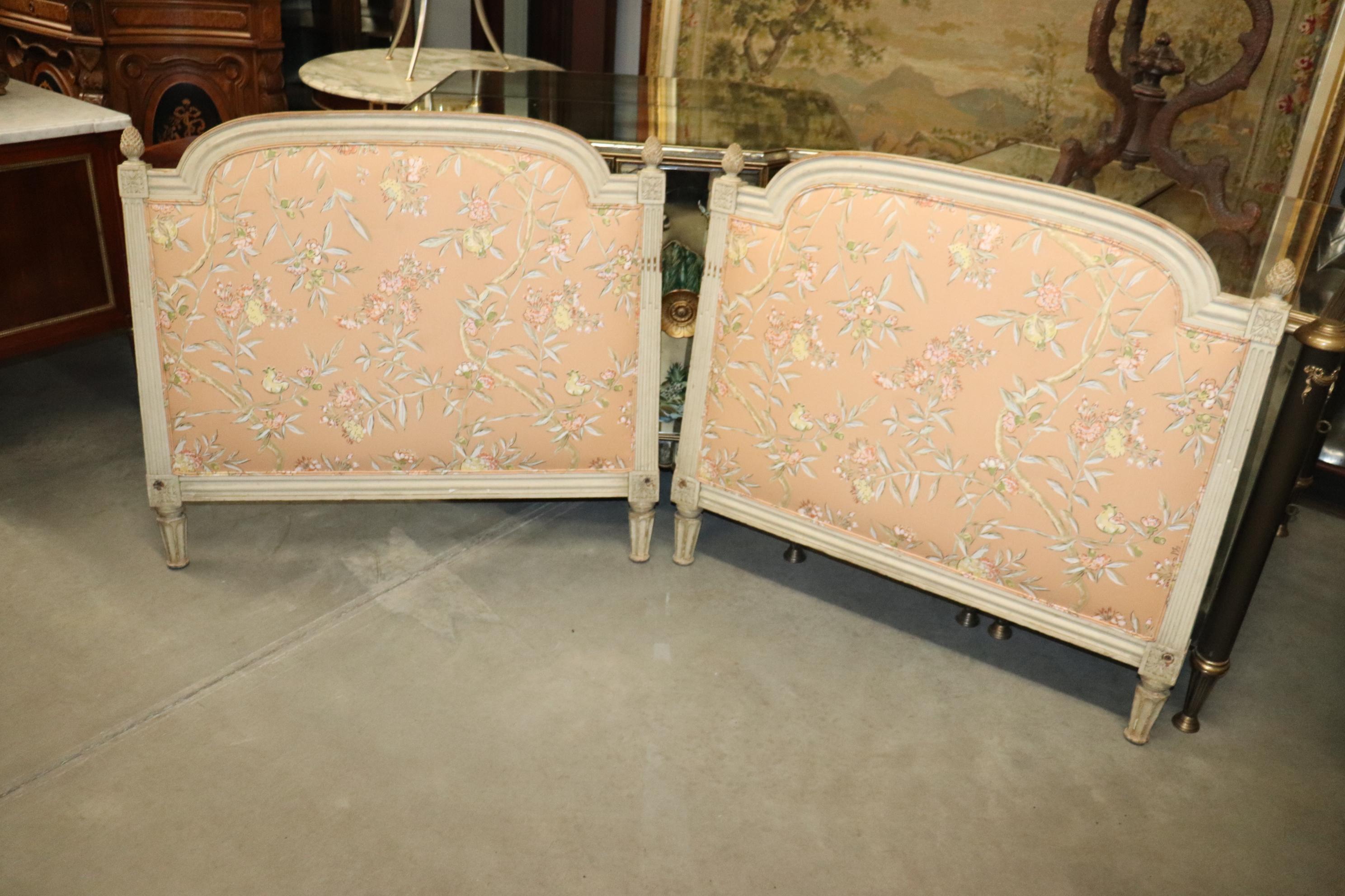 This is a pair of gorgeous French Louis XVI style painted headboards that can be used as twin beds with metal frames attached or even with some customization, a french daybed or chaise. The headboards each date to teh 1940s and measure 43 wide x 2.5