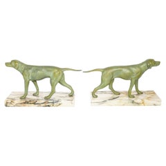 Paire de sculptures de chiens en bronze et marbre, France, XIXe siècle