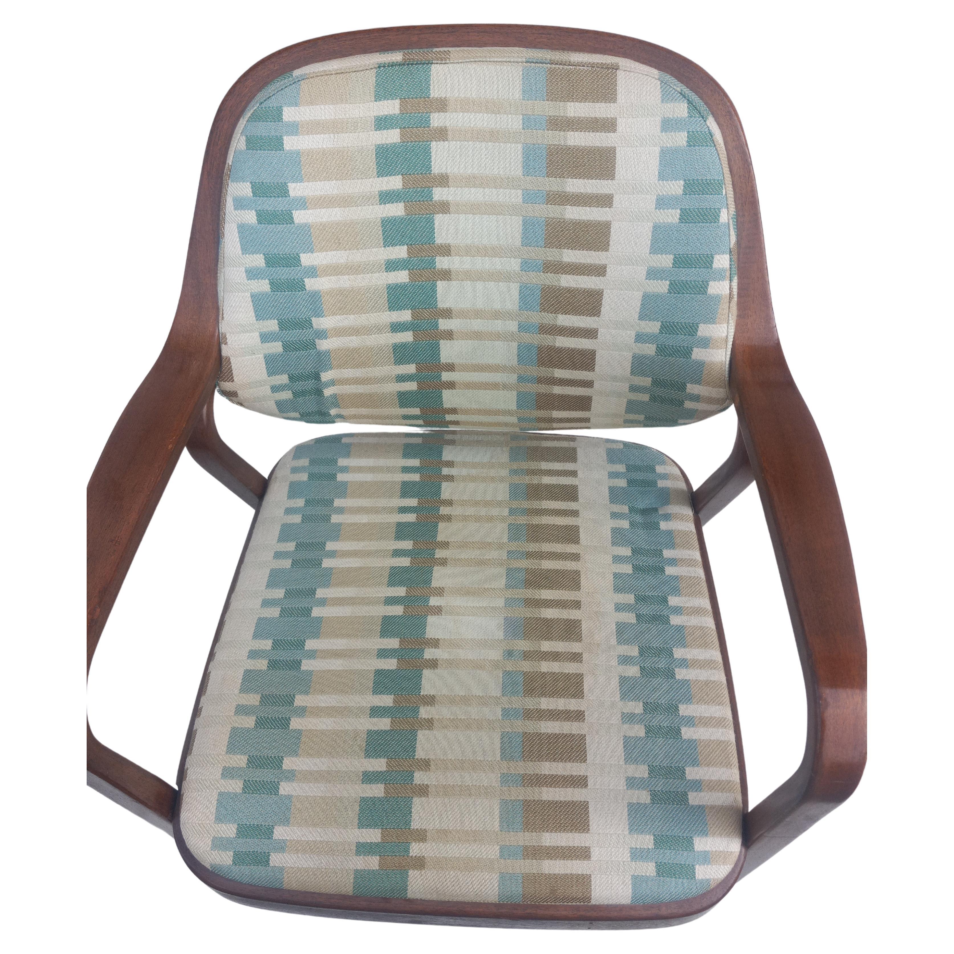 This is a beautiful pair of Don Petit Bentwood Armchairs. He designed these chairs for Knoll International. They're sculpted in bentwood and have a nice Knoll fabric. 