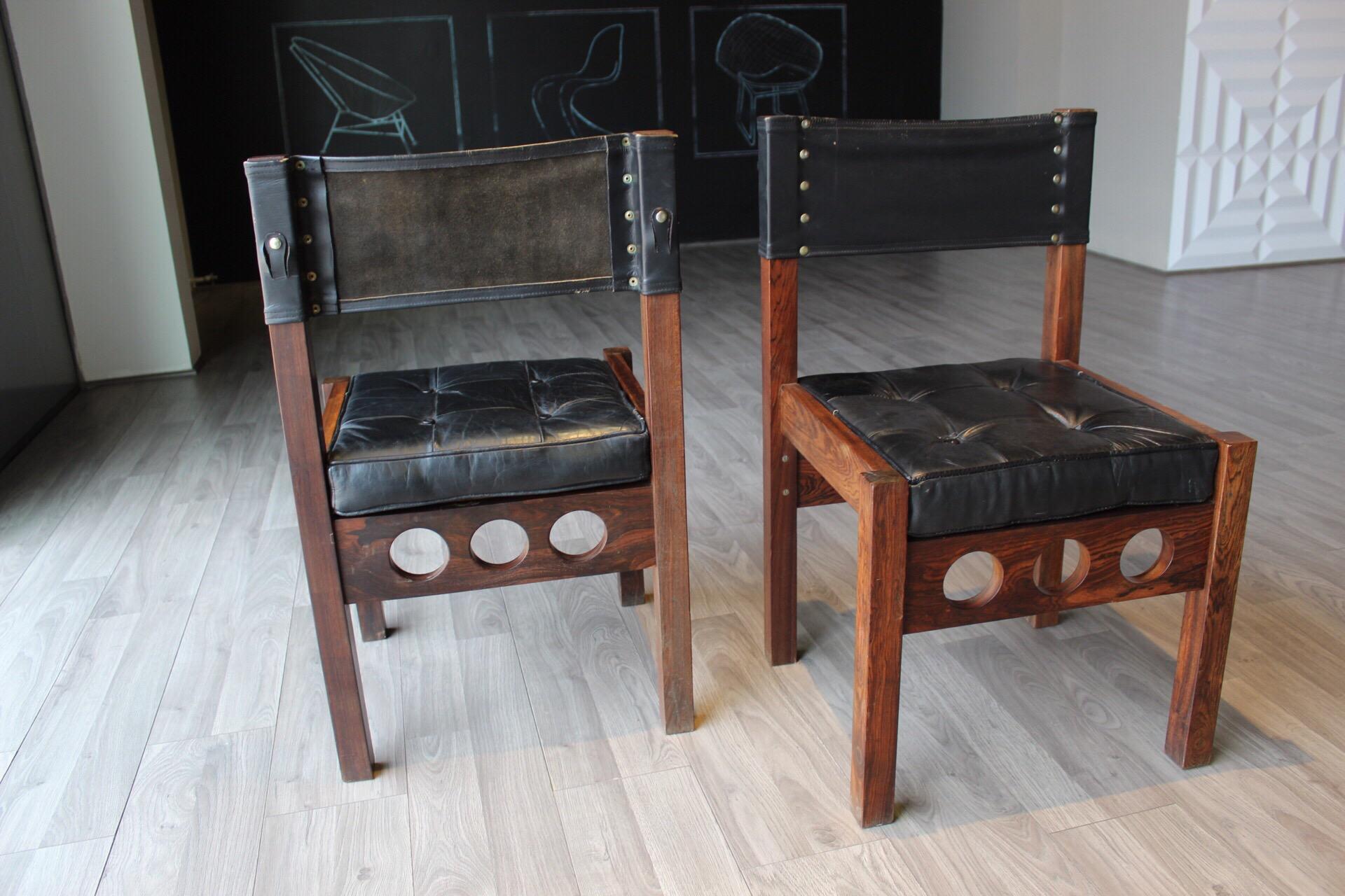 Pair of Don Shoemaker dining chairs, original leather on the seat and back, reversible seat and original buttons too.
Born in Nebraska, Don S. Shoemaker studied painting at The Fine Arts Institution of Chicago. In the late 1940s, he moved to Mexico