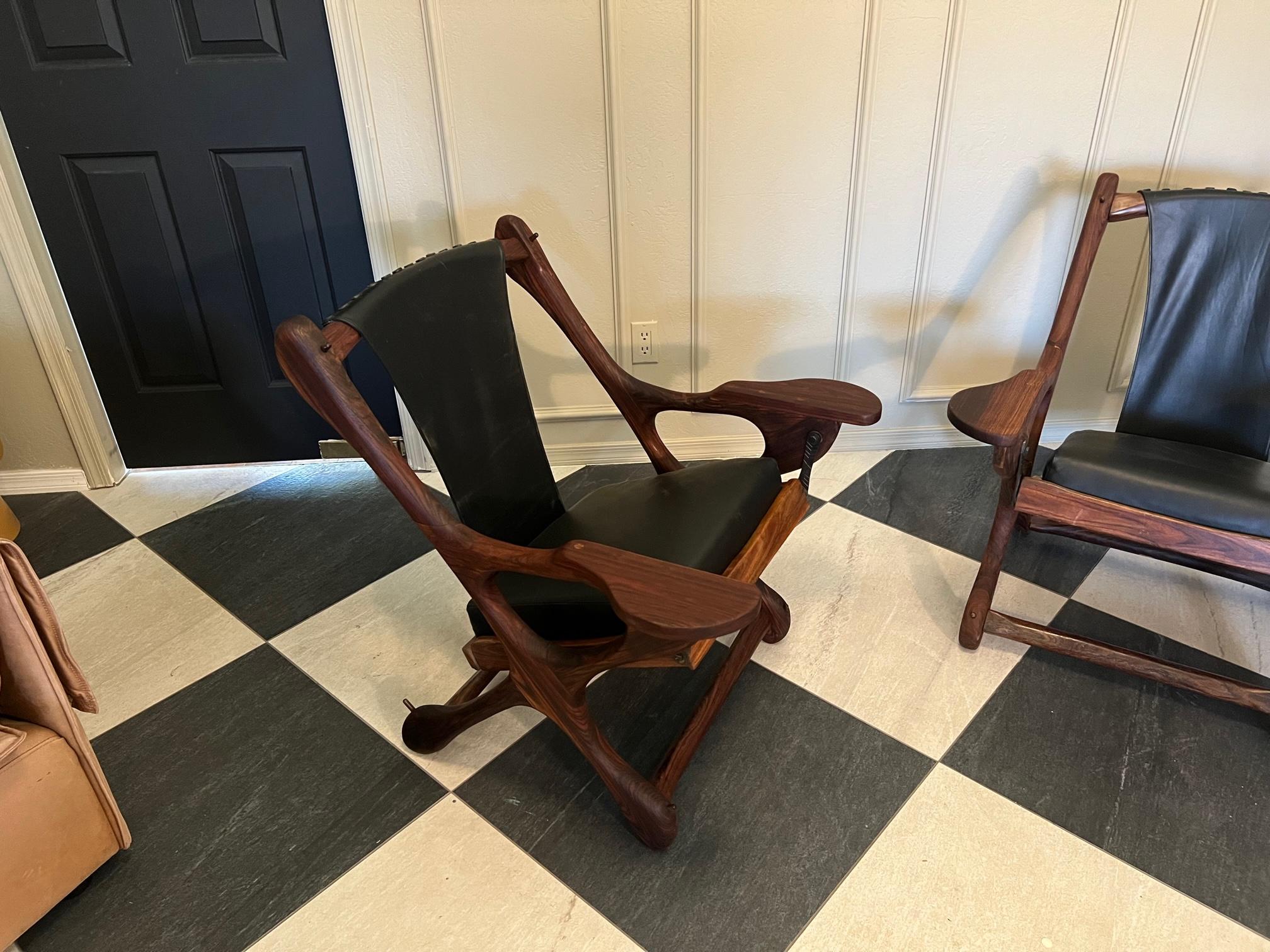 Mid-20th Century pair of Don Shoemaker rosewood swinger longe chairs mid century modern  For Sale