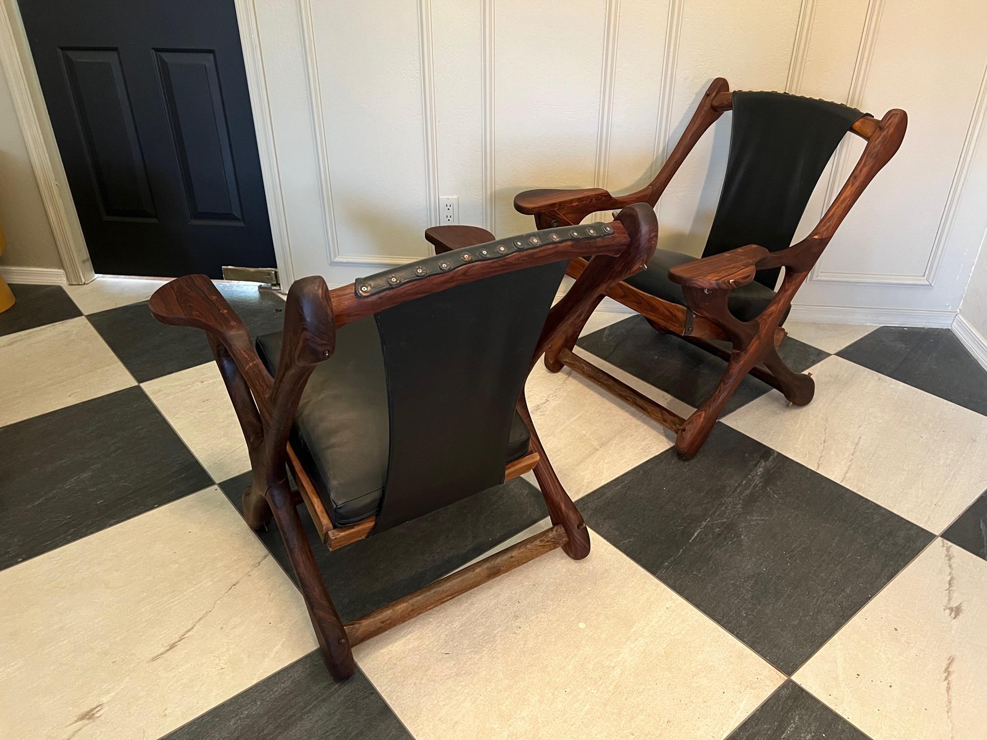 Rosewood pair of Don Shoemaker rosewood swinger longe chairs mid century modern  For Sale