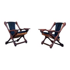pair of Don Shoemaker rosewood swinger longe chairs mid century modern