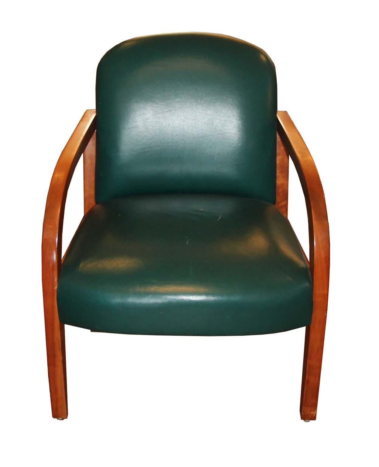 This pair of Donghia vintage armchairs in original green leather. The wood is solid maple, all joints are rock solid and built to last. The green leather has some wear but not structural damage or rips, see photos. Each chair is signed in two places