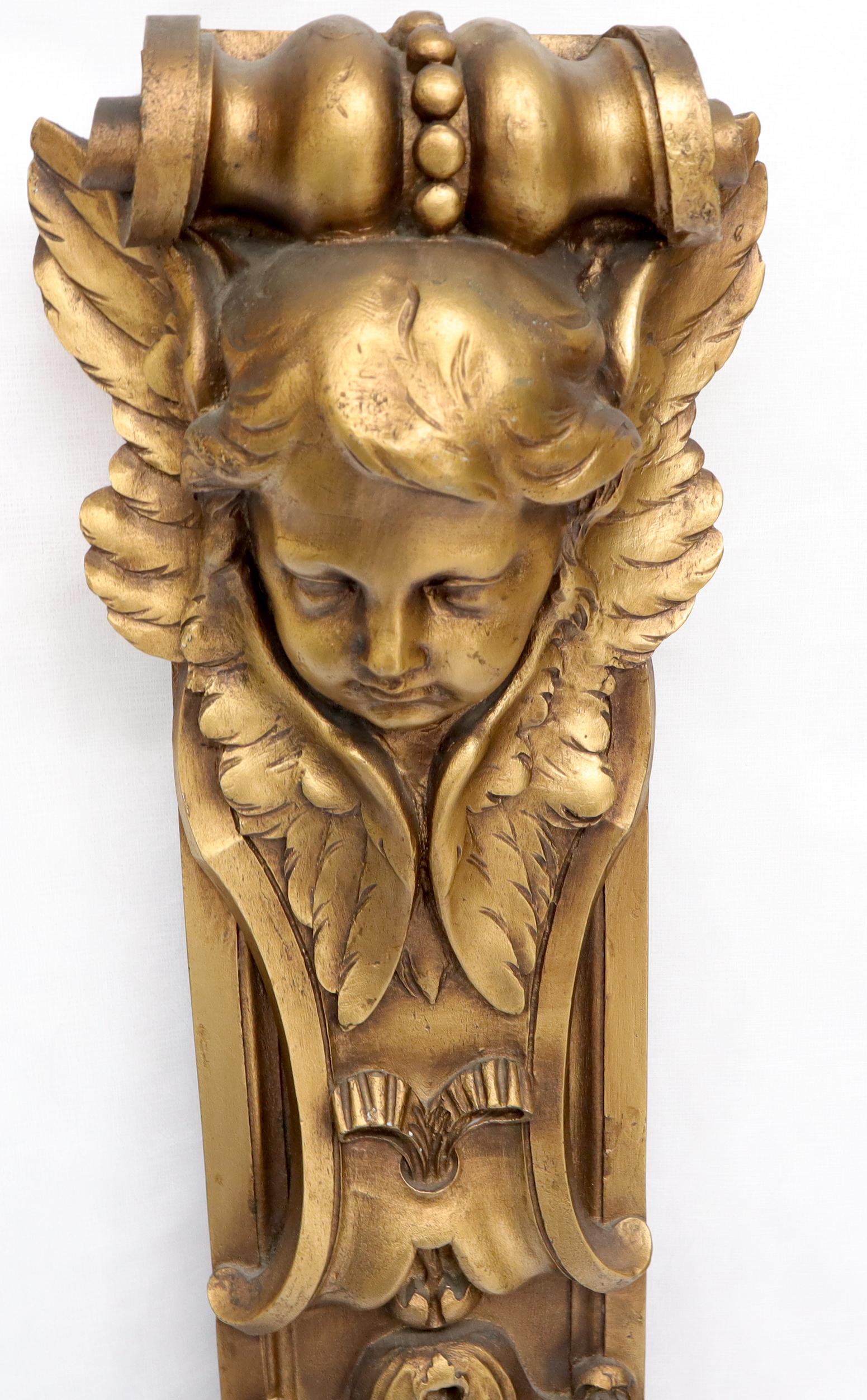 20th Century Pair of Door Frame Decoration Mounts Columns Sculptures Gold Cherubs Motive For Sale