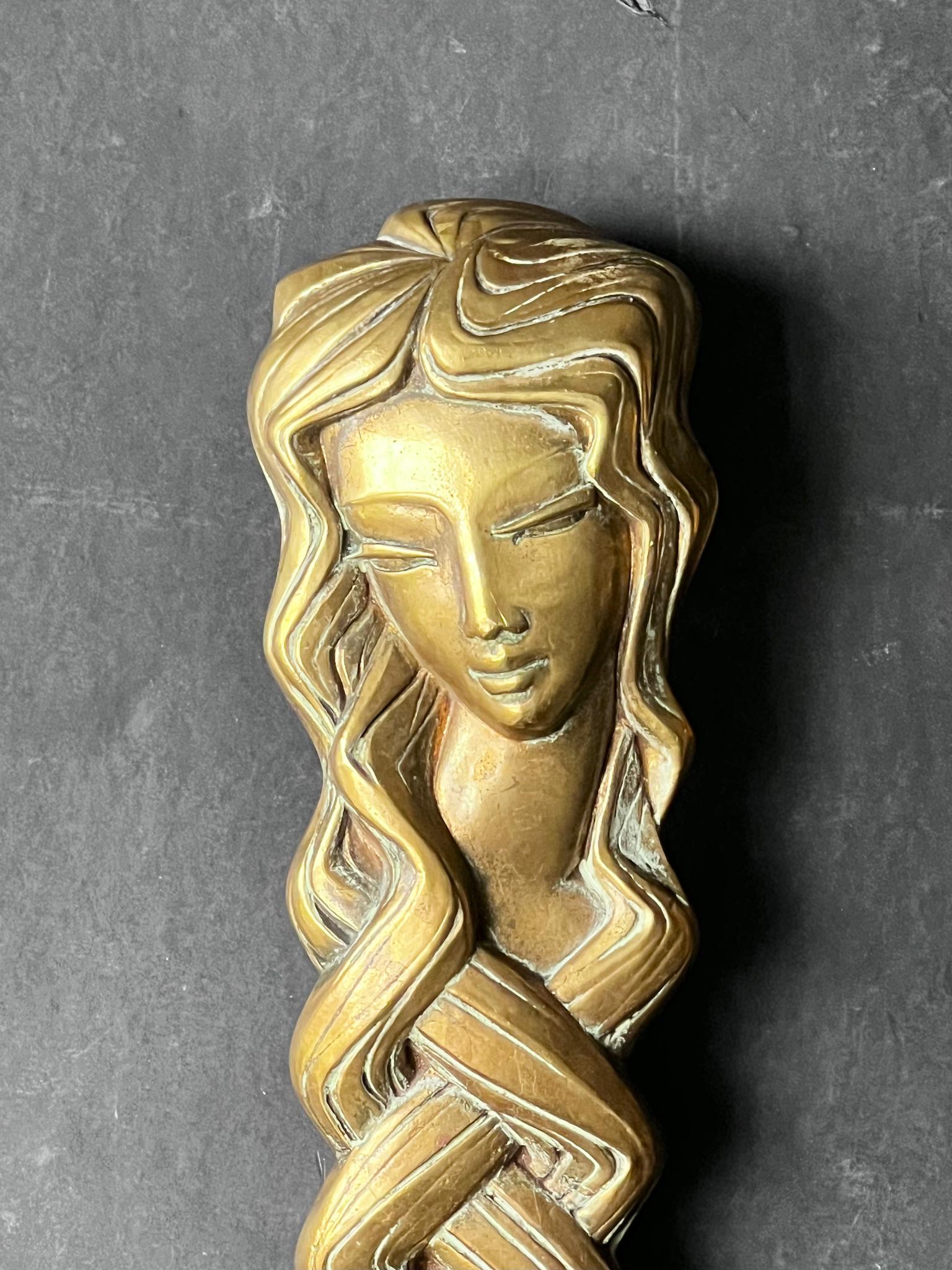 Mid-Century Modern Pair of Door Handles in the form of a Woman's Face with Braided Hair For Sale