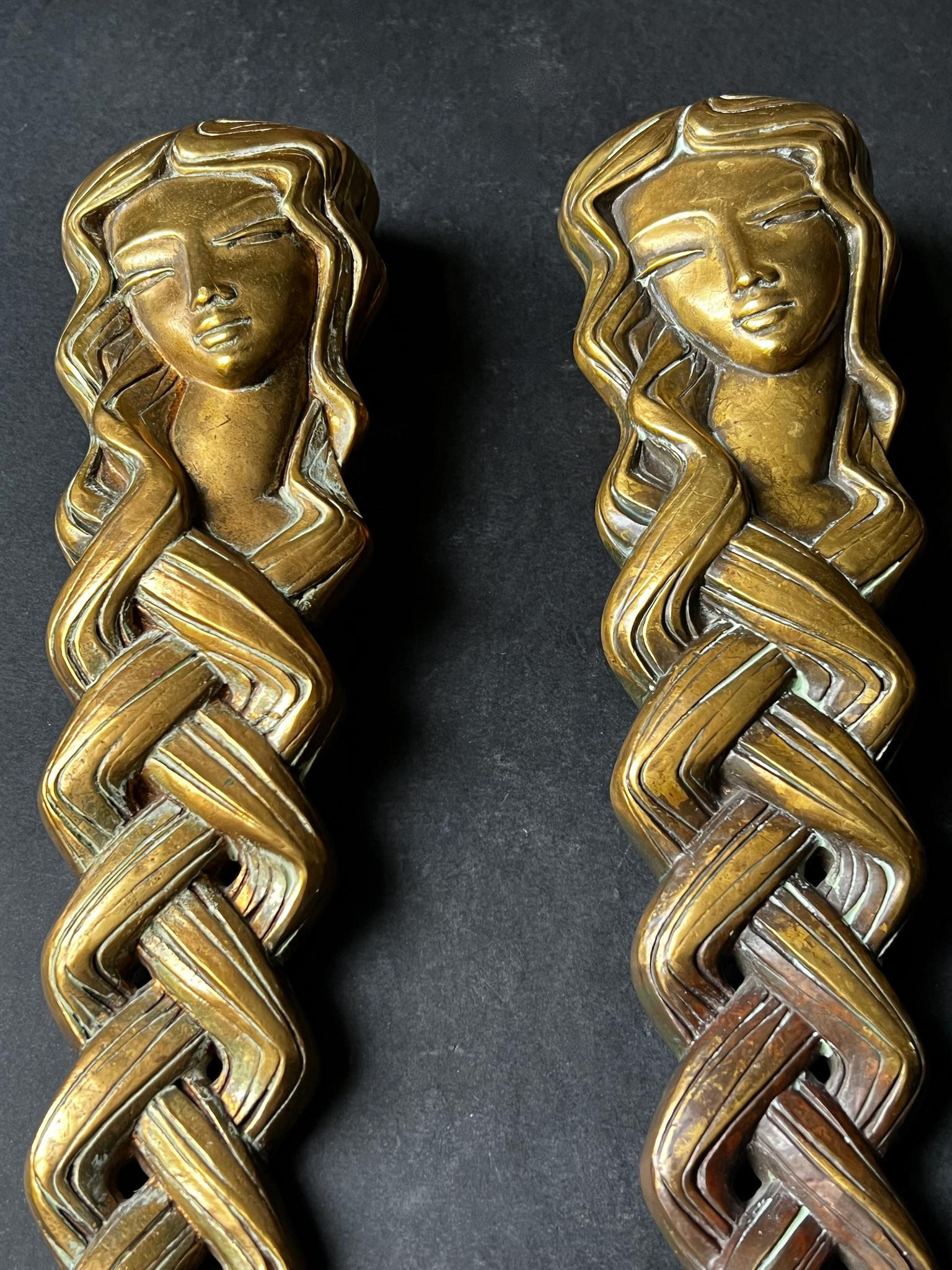 German Pair of Door Handles in the form of a Woman's Face with Braided Hair For Sale