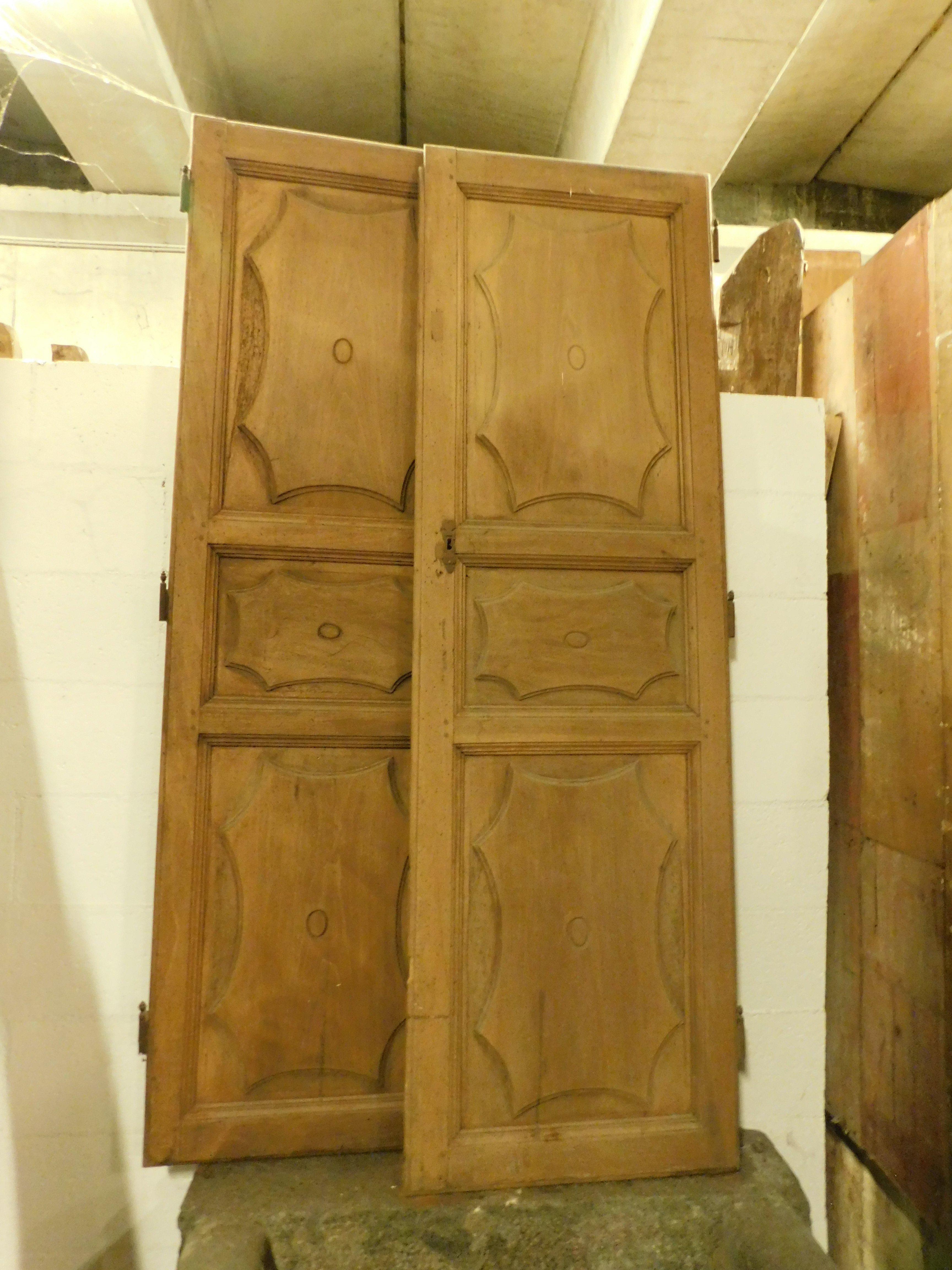 Antique pair of doors for wall wardrobe or to be used as small doors, panels carved in solid beech wood, measuring cm h 182 x 116 width, original from the mid 19th century