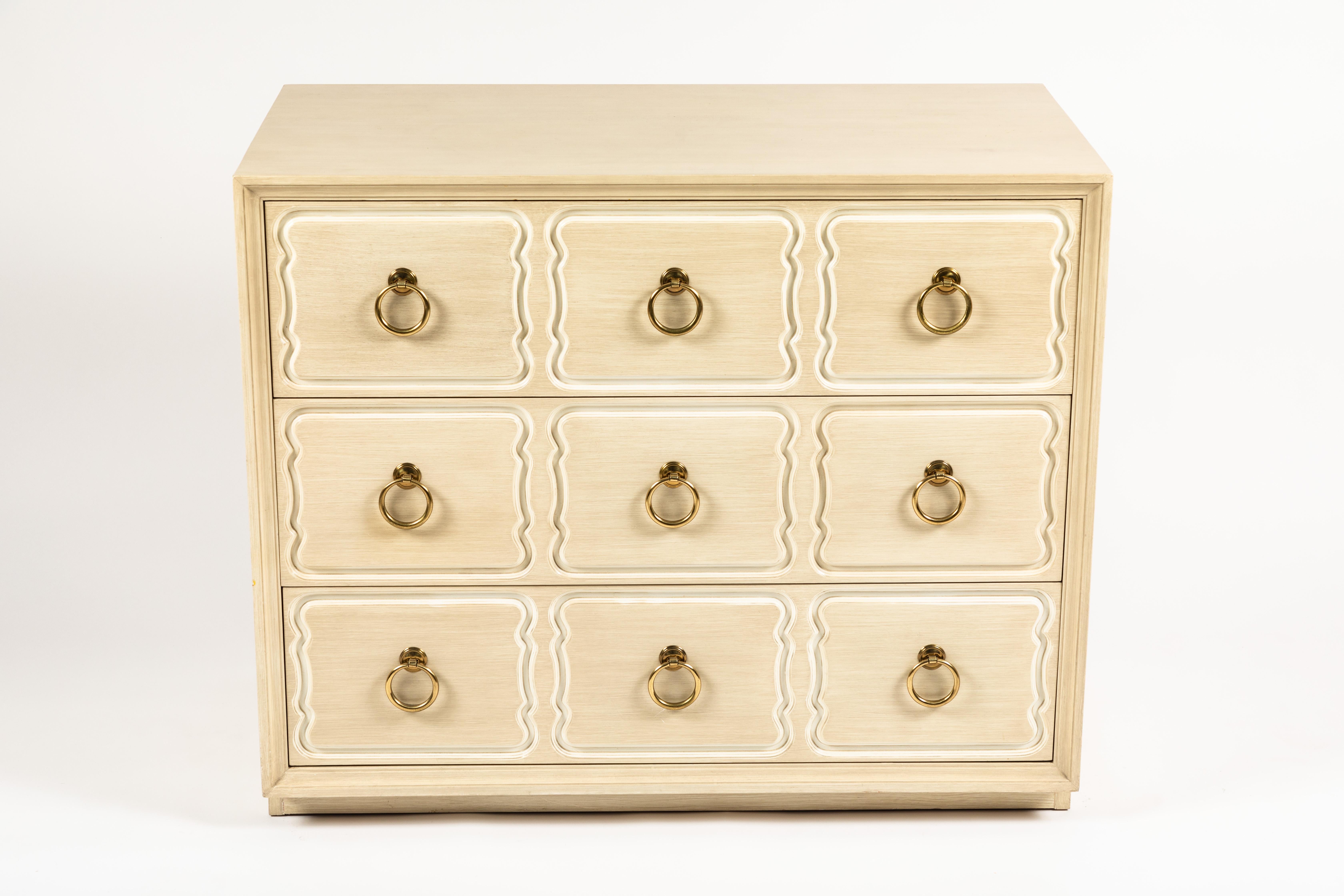Here is the genuine article, there are many of these chests on the market that are copies and represented as being the model designed by Dorothy Draper. Signed inside the top drawer Heritage. Heritage/Henderdon is the company who was licensed to