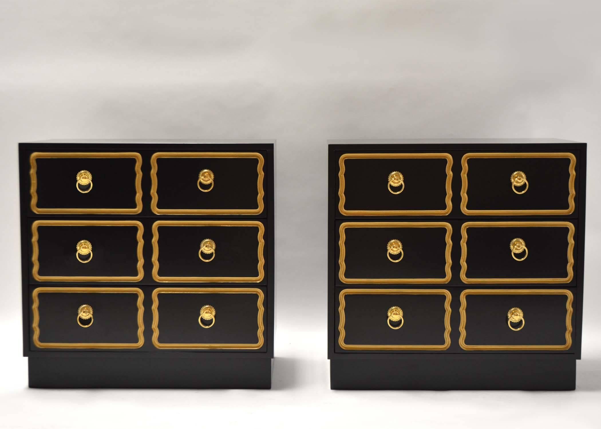 Pair of three-drawer Dorothy Draper Espana chests or nightstands for Heritage Henredon with new black lacquer finish. Brass ring pulls are replacements, on black lacquered drawer fronts with incised gold decoration.