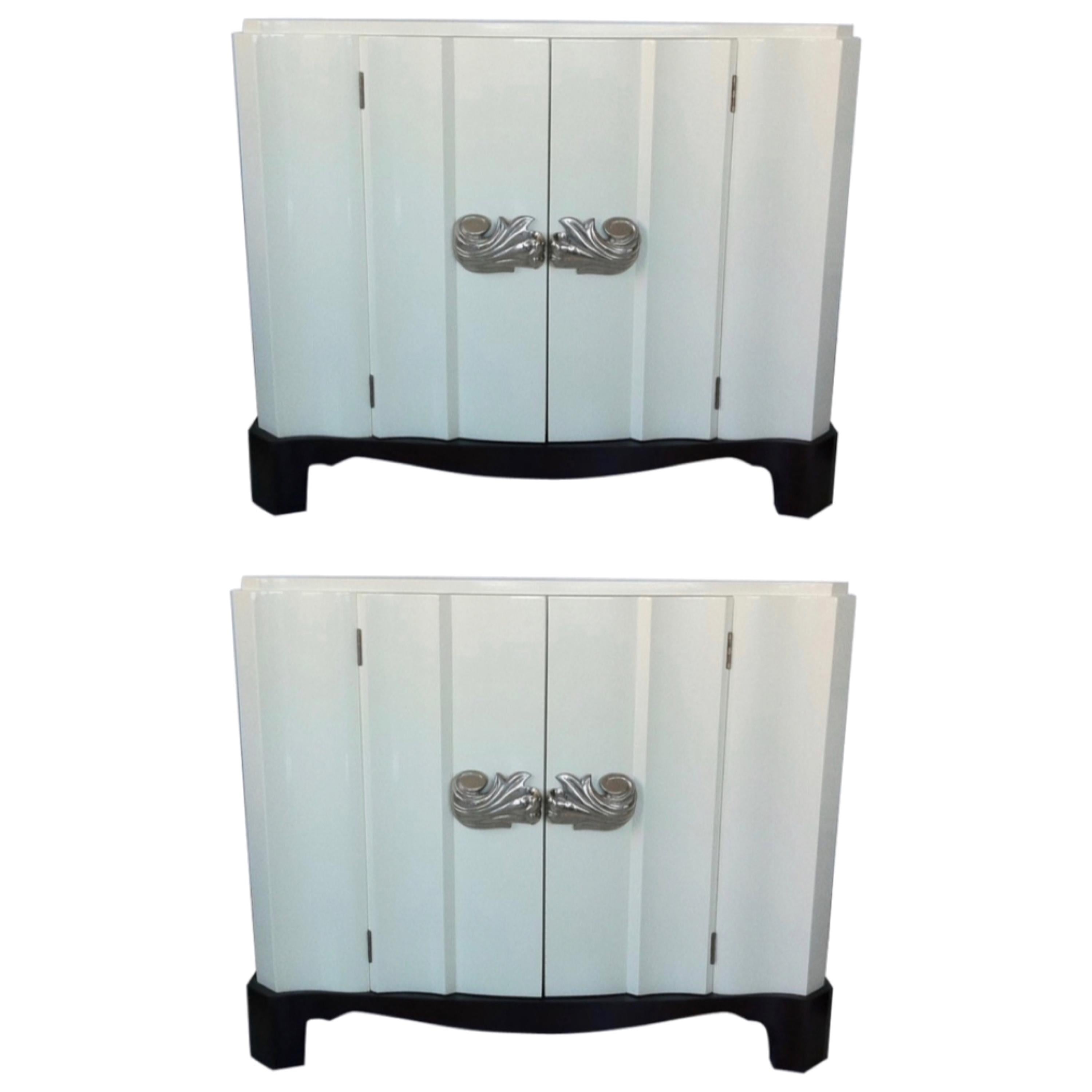 Pair of Dorothy Draper Serpentine Chests in Ivory Lacquer with Nickel Pulls For Sale