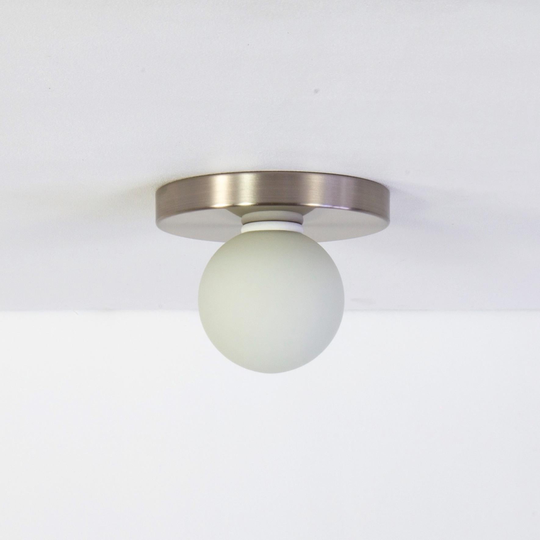 This listing is for 2x Globe Flush Mounts in brushed nickel designed and manufactured by Research.Lighting.

Materials: Brass, Steel & Glass
Finish: Brushed Nickel
Electronics: 1x G9 Socket, 1x 4.5 Watt LED Bulb (included), 450 Lumens
ADA Compliant.