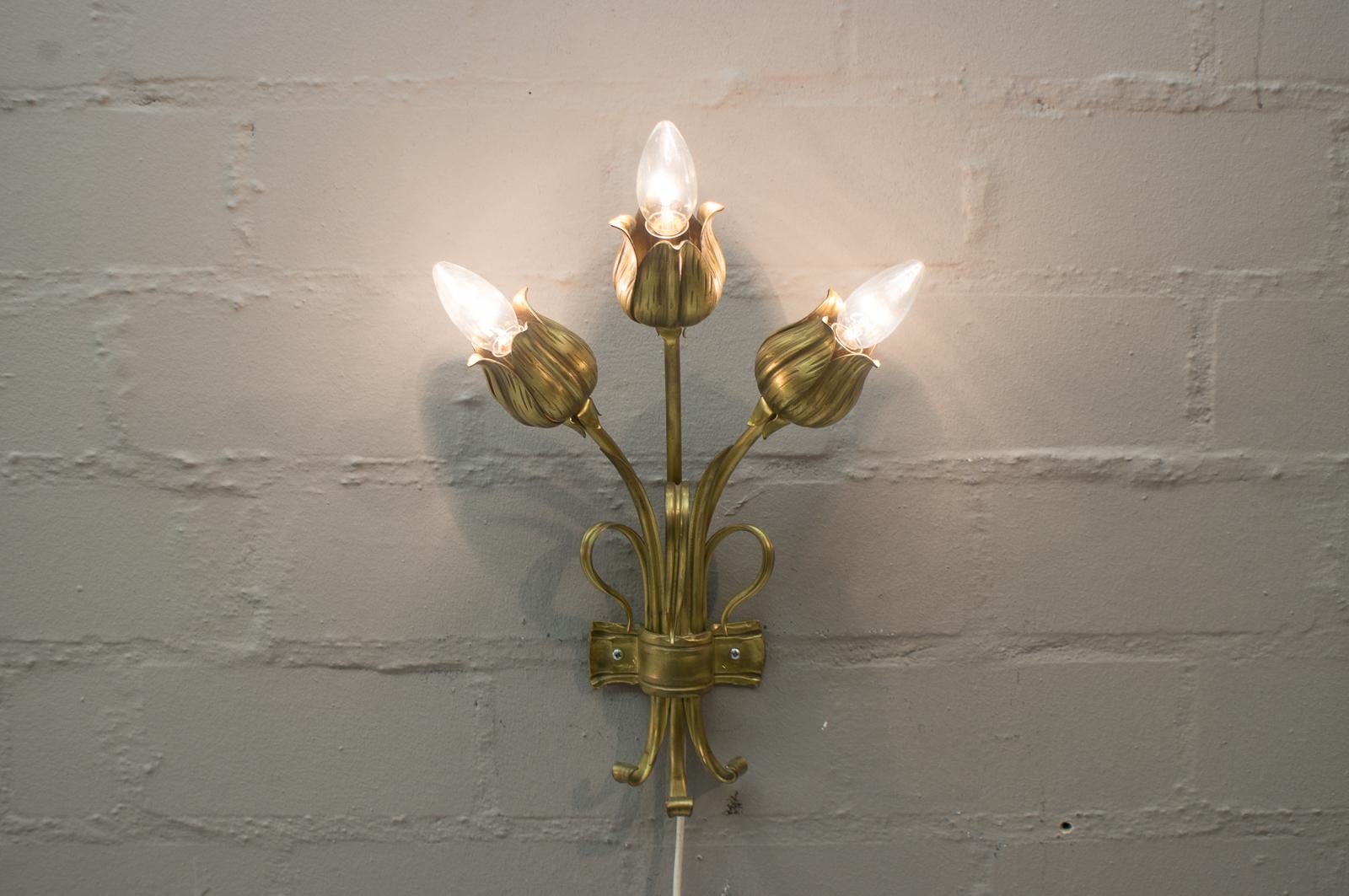 A very great form language. 

Beautifully elaborated flowers, very harmonious in overall appearance. 

Very good quality.

This lamp can be used as either a wall or ceiling lamp. It has 8 E14 sockets.

The lamps are executed with E14 Edison