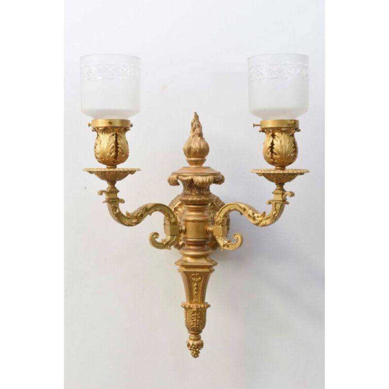 Pair of gilt sconces with cut glass shades. two arm. neoclassical style. American, C. 1900

Dimensions: 
Height: 20
Width (Diameter): 14.