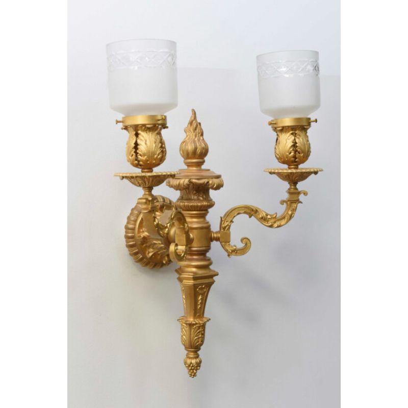 Neoclassical Pair of Double Arm Gilt Sconces with Cut Glass Shades For Sale