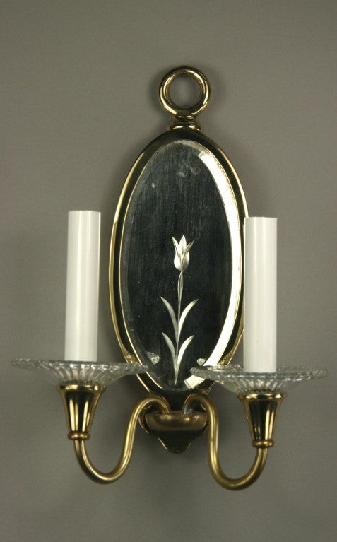 1-4054 a pair of polished brass oval etched mirror featuring a double arm ending with glass bobeches sconce.
Measures: 2 x 3 inch switch box required.
Priced per pair.
 