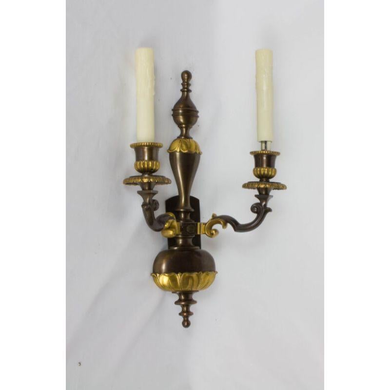 Patinated Pair of Double Arm Two Toned Sconces For Sale