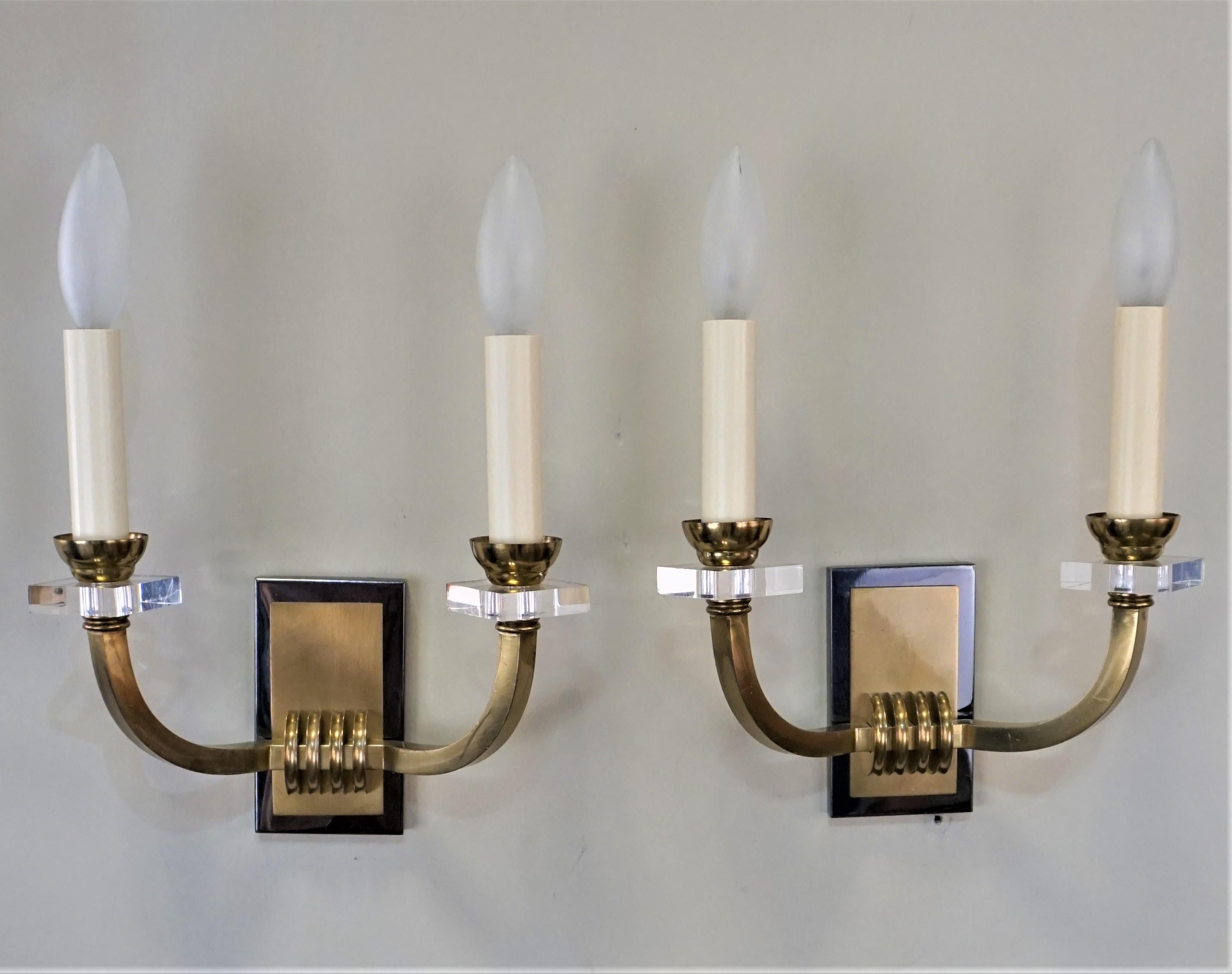 Bronze Pair of Double Arm Wall Sconces by Jacque Adnet