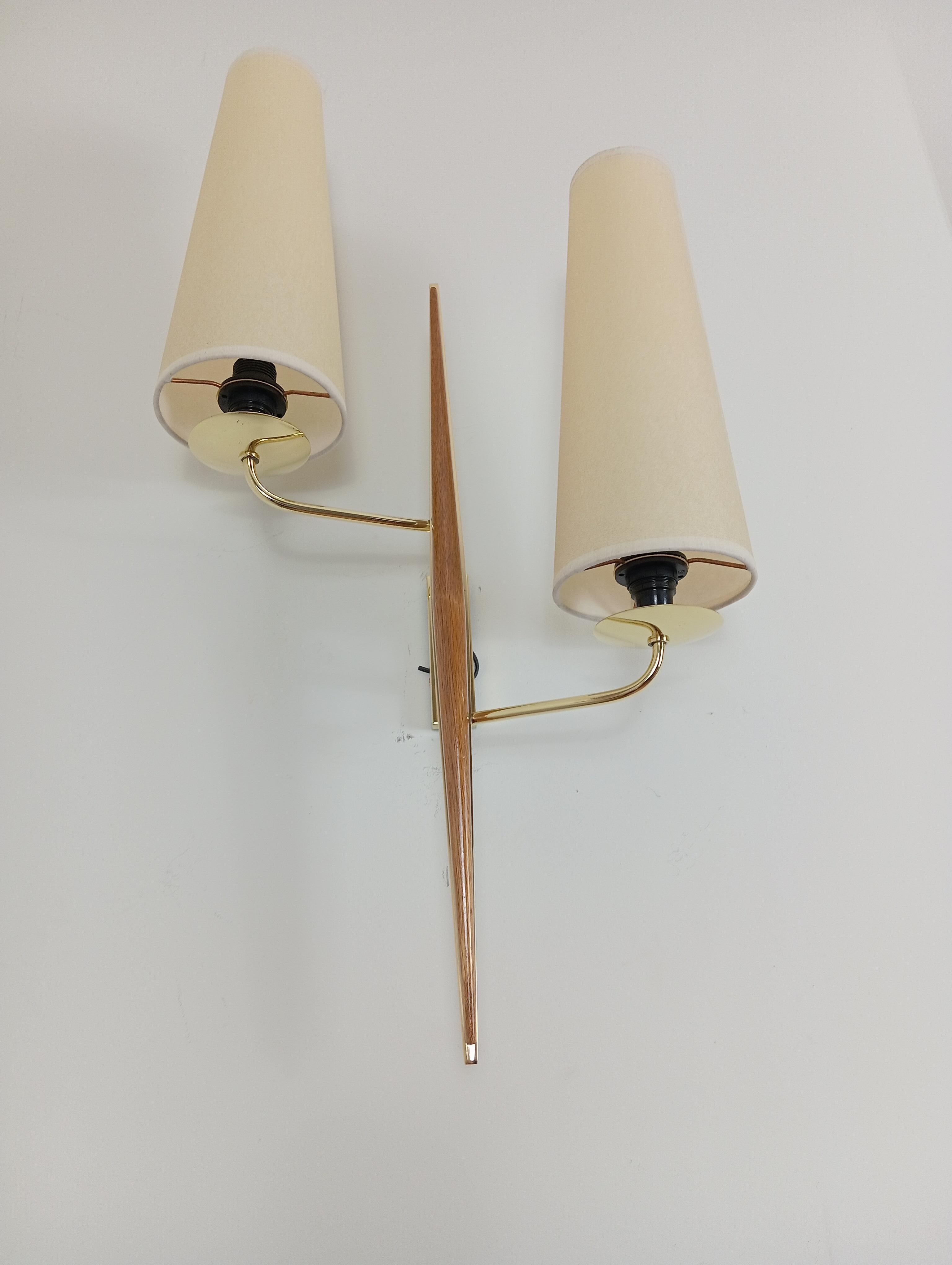 Pair of double sconces in brass and teak wood, Maison Lunel circa 1950 3