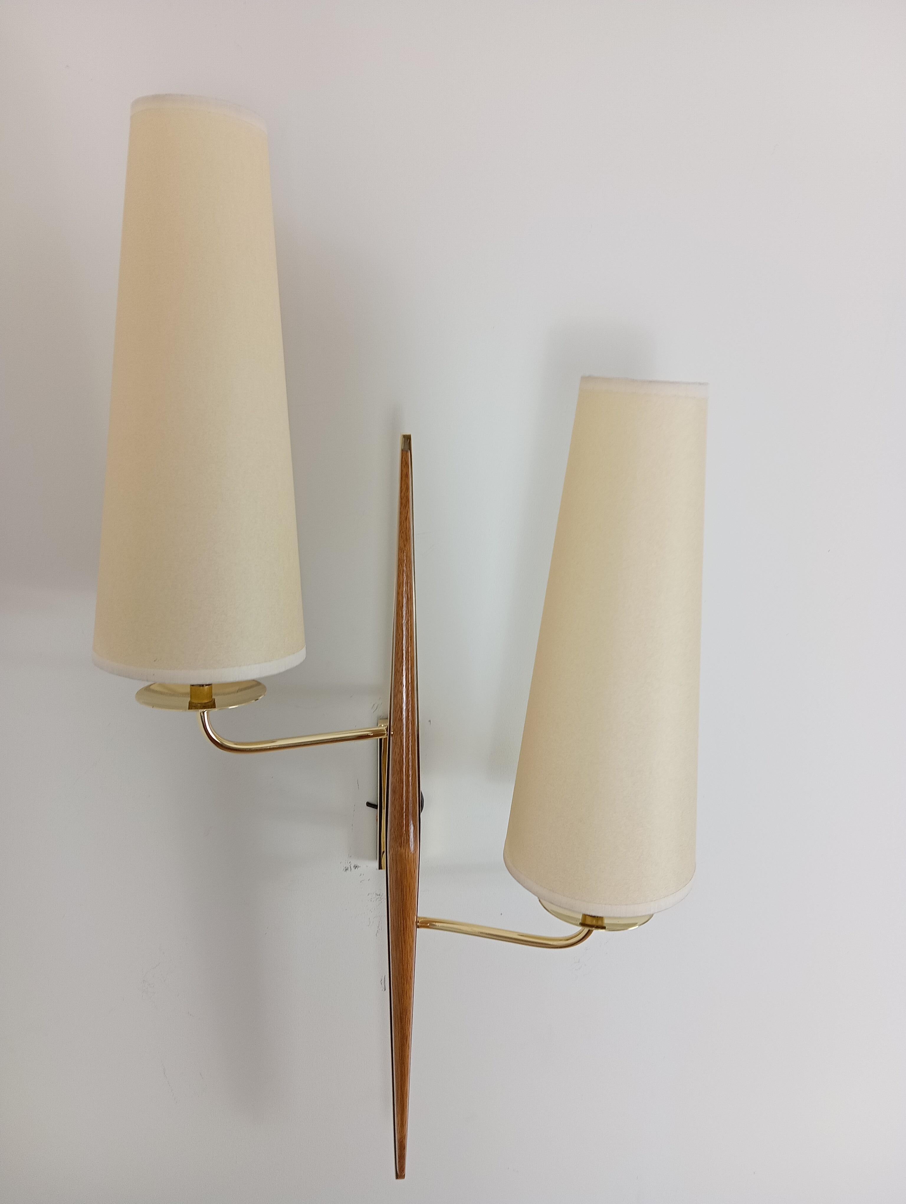 Pair of double sconces in brass and teak wood, Maison Lunel circa 1950 7