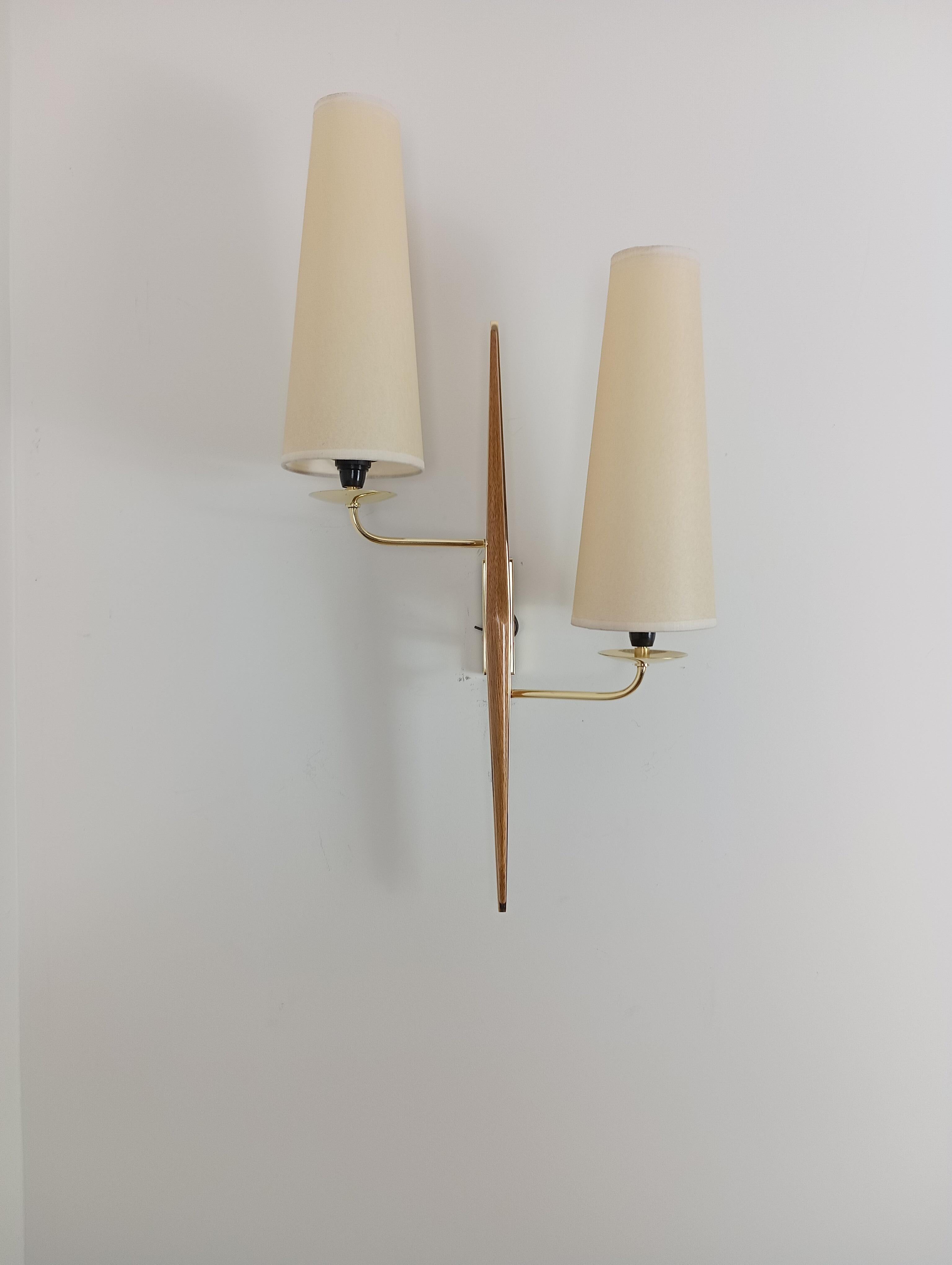 Pair of double sconces in brass and teak wood, Maison Lunel circa 1950 12