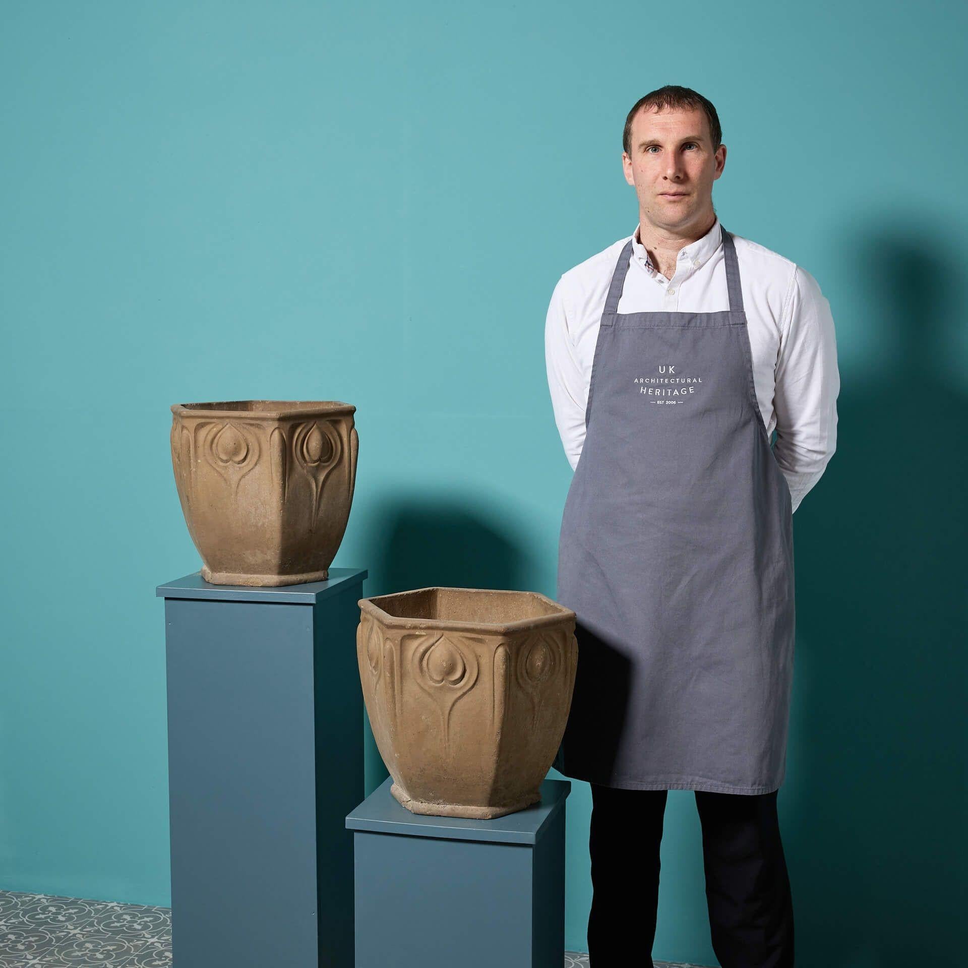 A pair of antique Doulton & Co stoneware planters dating to circa 1890. 

The neutral tone of the brown stoneware with its unglazed finished only compliments the unique hexagonal shape. 

The perfect pair for a traditional garden or period townhouse
