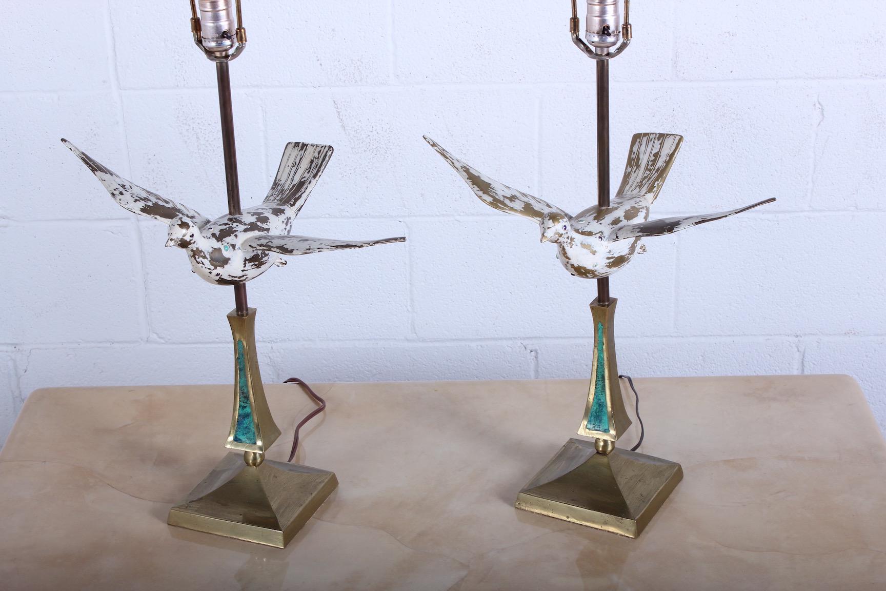 A rare pair of brass dove lamps designed by Pepe Mendoza.