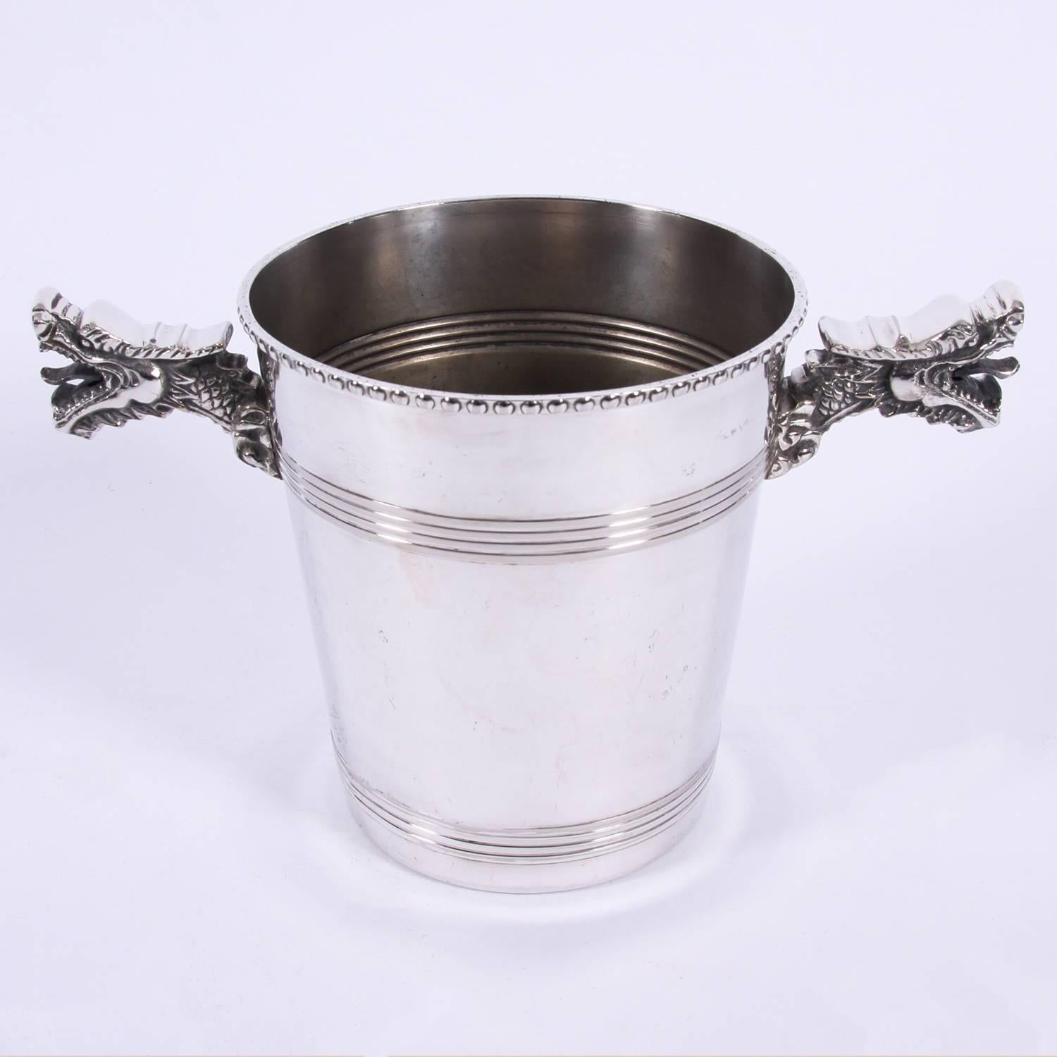 French circa 1970

A striking pair of silver plated ice buckets with dragon heads design.
 