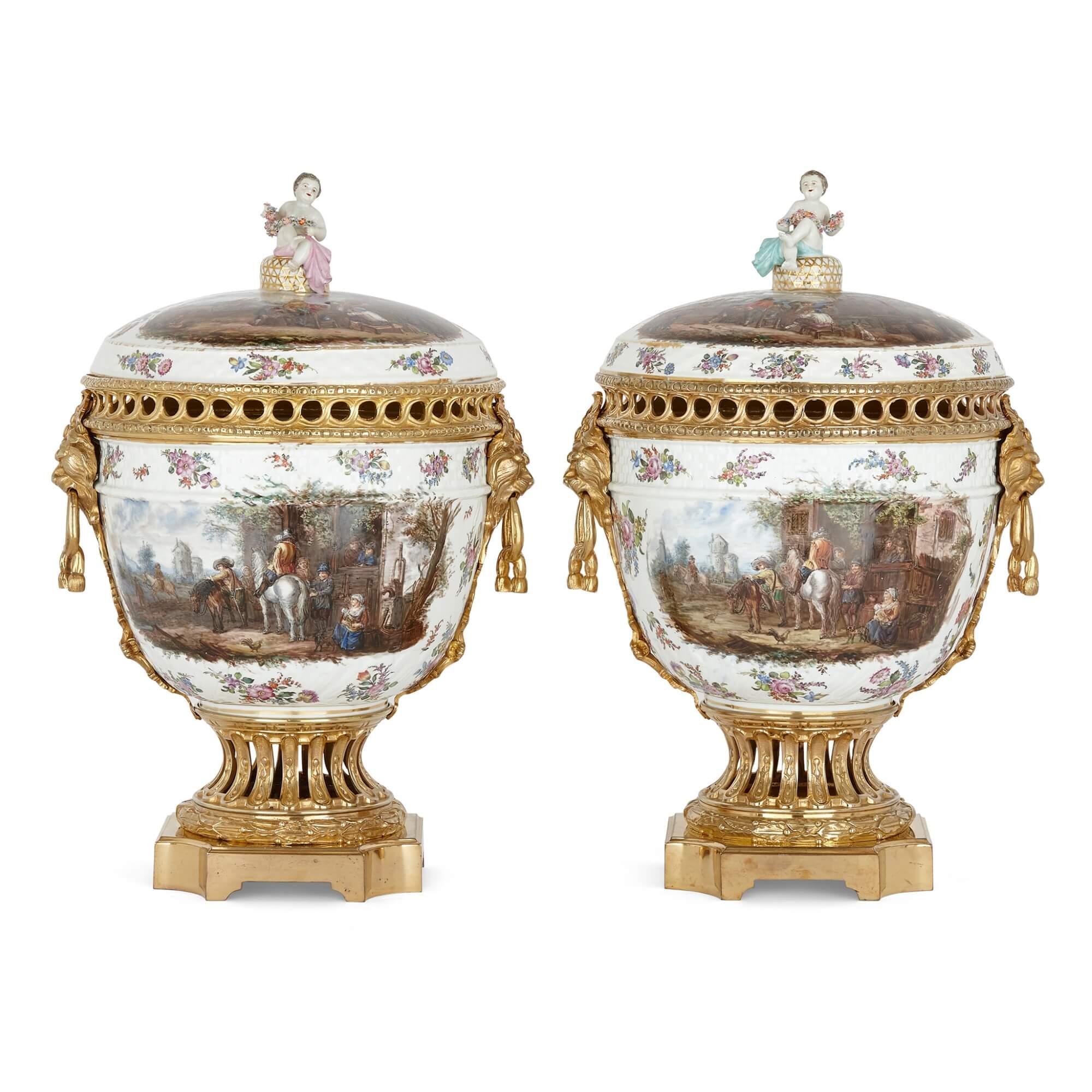 Pair of Dresden porcelain and gilt bronze vases.
German, late 19th century.
Measures: height 57cm, width 39cm, depth 33cm.

This fine pair of Dresden porcelain pot pourri vases features ornate gilt bronze mounts. The vases have krater-shaped,