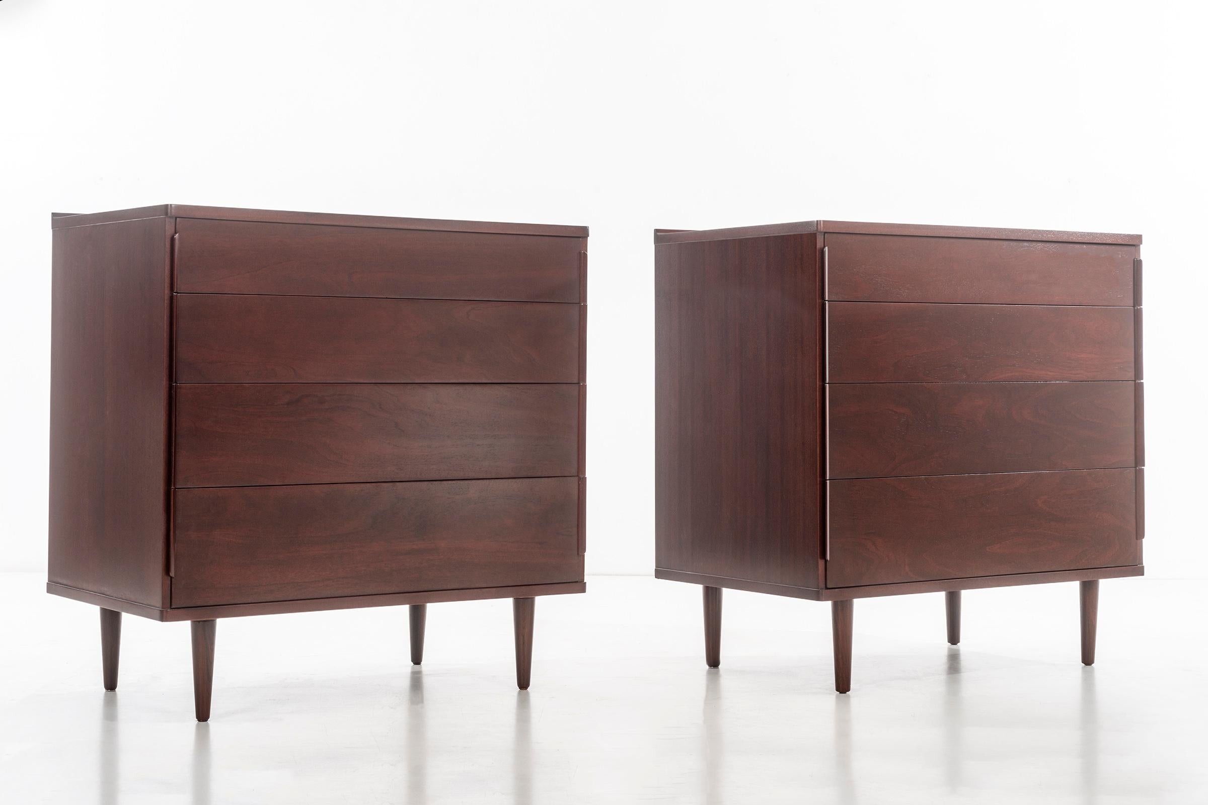 Wormley for Dunbar pair of dressers, mahogany with solid turned rosed legs.

Green metal to drawer inside 