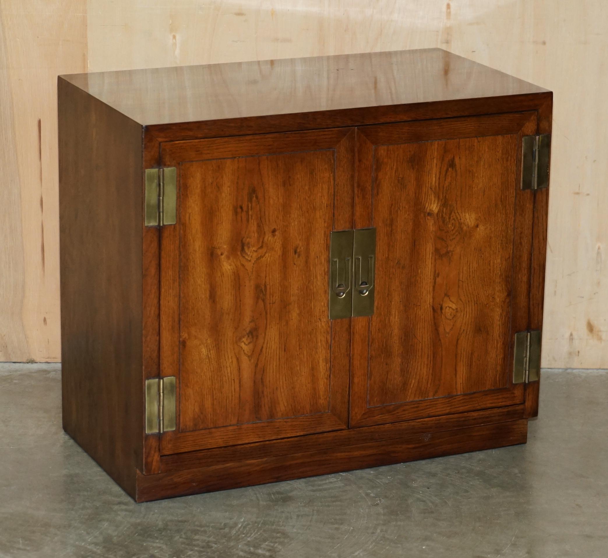 Royal House Antiques

Royal House Antiques is delighted to offer for sale this lovely vintage pair of Drexel Heritage Furniture mid century modern Military Campaign style sideboards which are part of a suite

Please note the delivery fee listed is