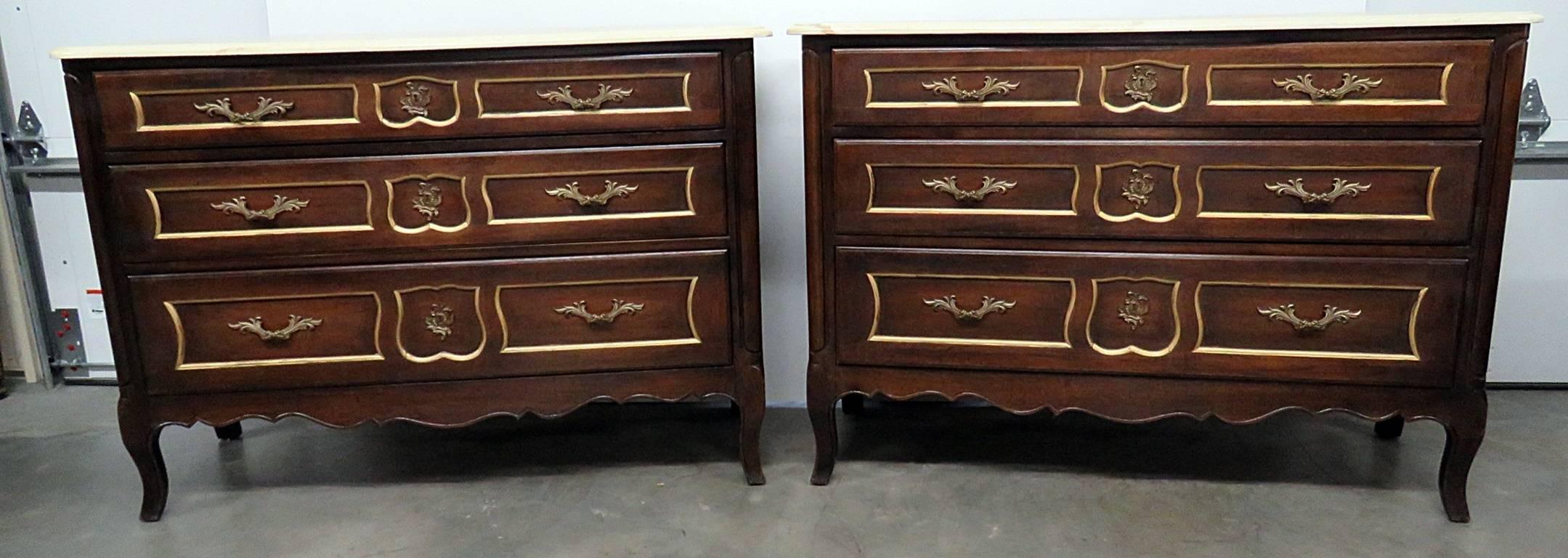 Pair of Drexel marble-top three-drawer commodes.