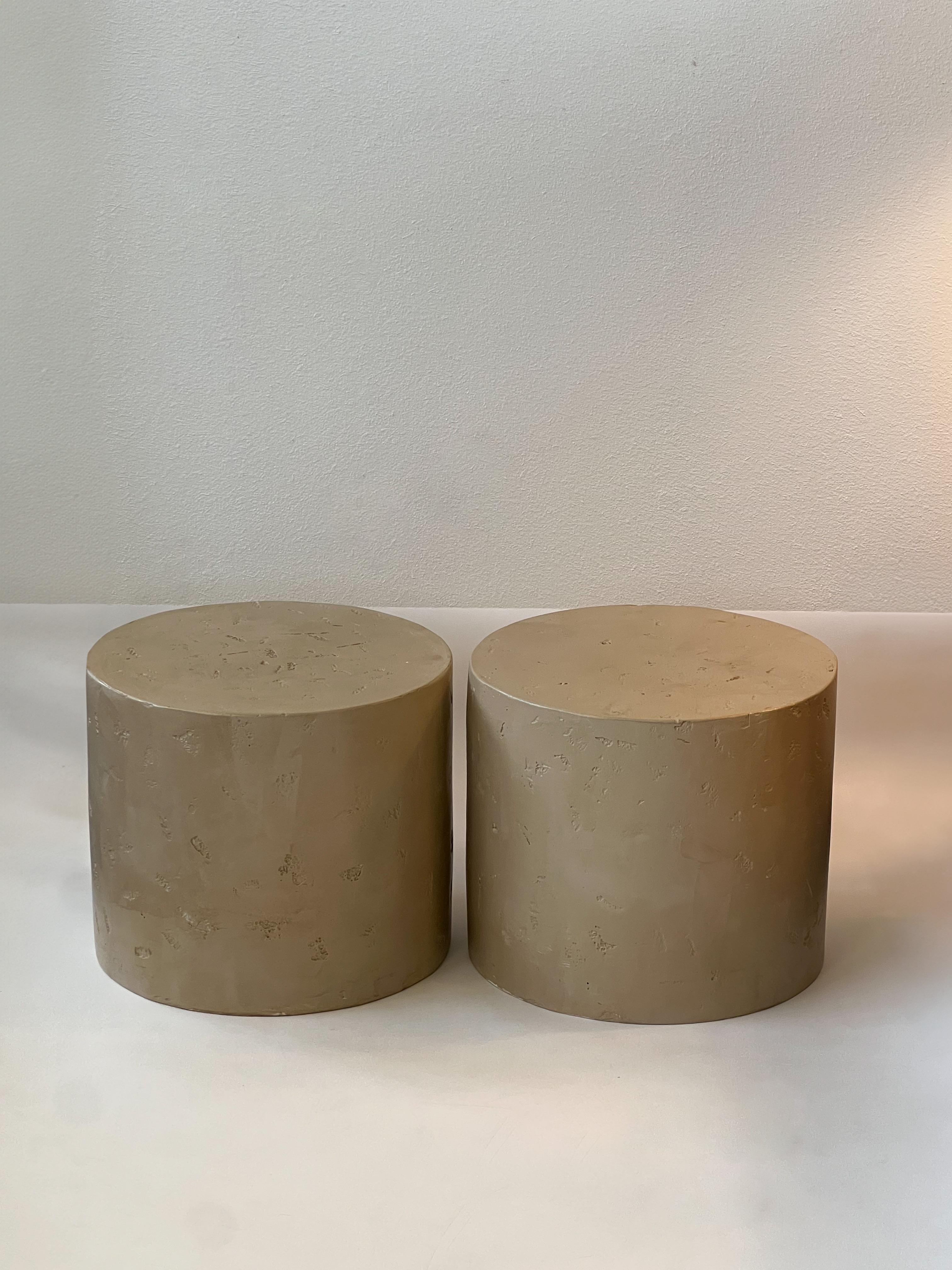 1980’s Drum side tables or coffee tables by Steve Chase. 
Constructed of wood covers with plaster and lacquer. 
In good vintage condition with minor wear consistent with age. 

Measurements: 19” Diameter 16” High. 