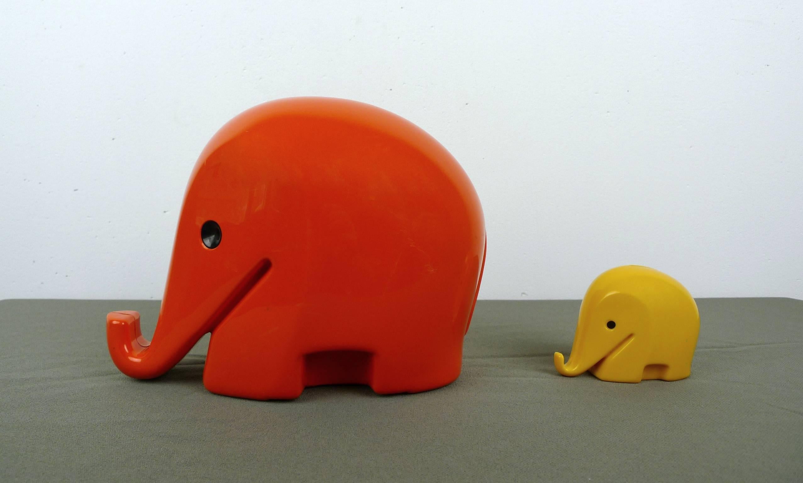 This large orange-red and small yellow Drumbo money-box were designed by Luigi Colani in the 1970s on behalf of Dresdner Bank as a giveaway. The large elephant can be emptied by means of a key, while the small elephant is locked and must be broken