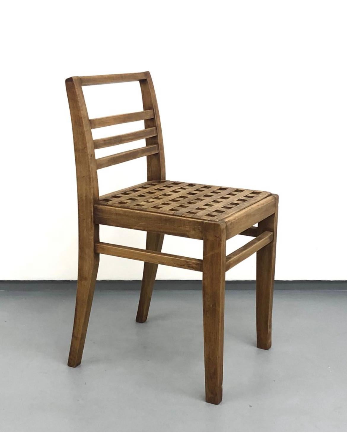 Pair of duckboard chairs model 103 in oak by René Gabriel, Norma, 1941

Set of 2 chairs in varnished stained oak with three slats back and duckboard seat designed by René Gabriel and published by Norma in 1941.

René Gabriel (1899 - 1950) is a