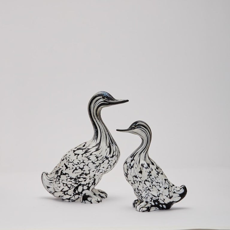 A pair of black and white animal sculptures by Archimede Seguso (1909-1999) Italy made circa 1970 comprising of two large ducks, in solid opaque glass.
Archimede Seguso was born on the island of Murano. His families glass artisan heritage dates back