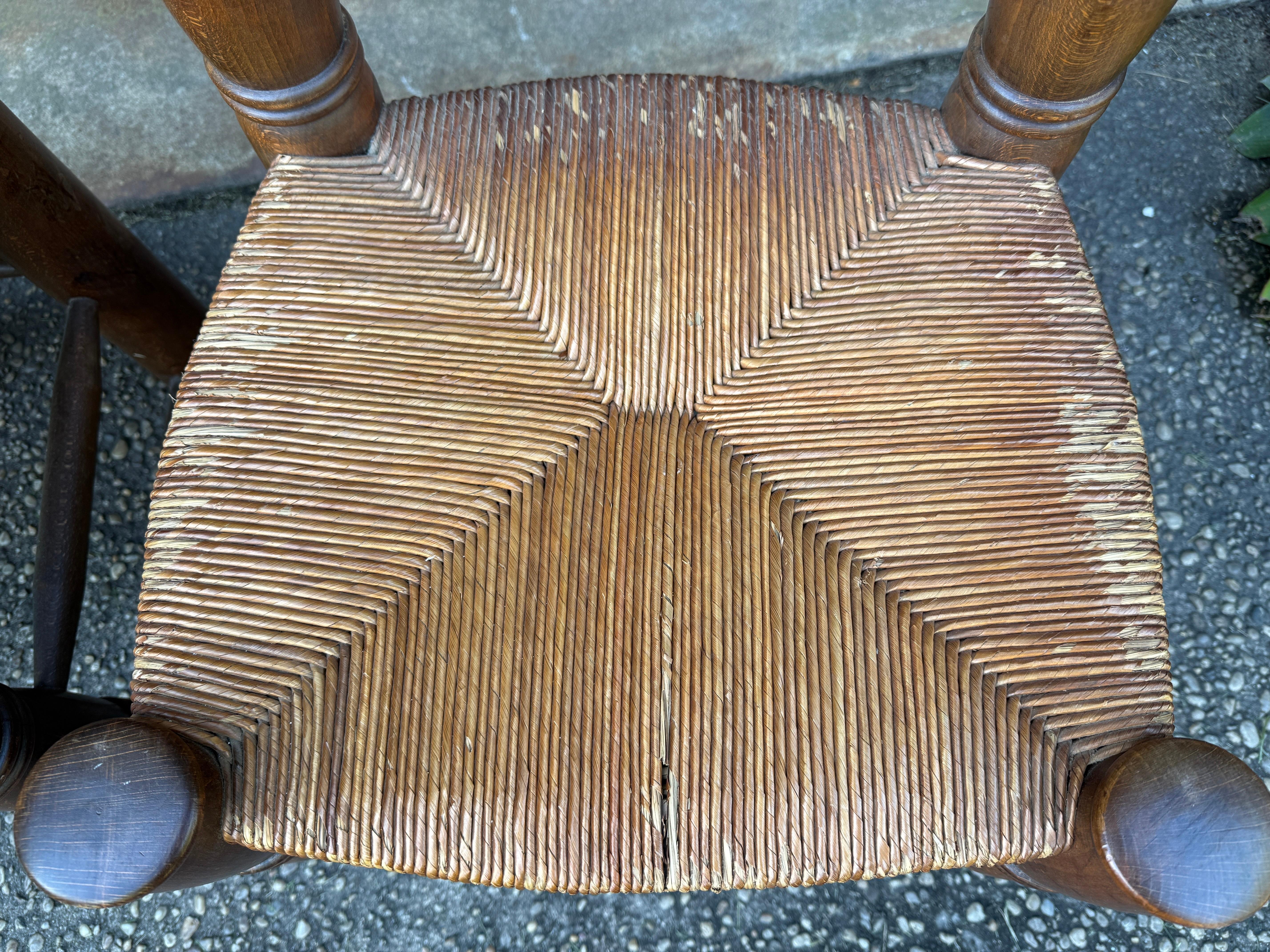 Pair of Dudouyt Fireside Oak Chairs w/ Thatch Seats For Sale 1