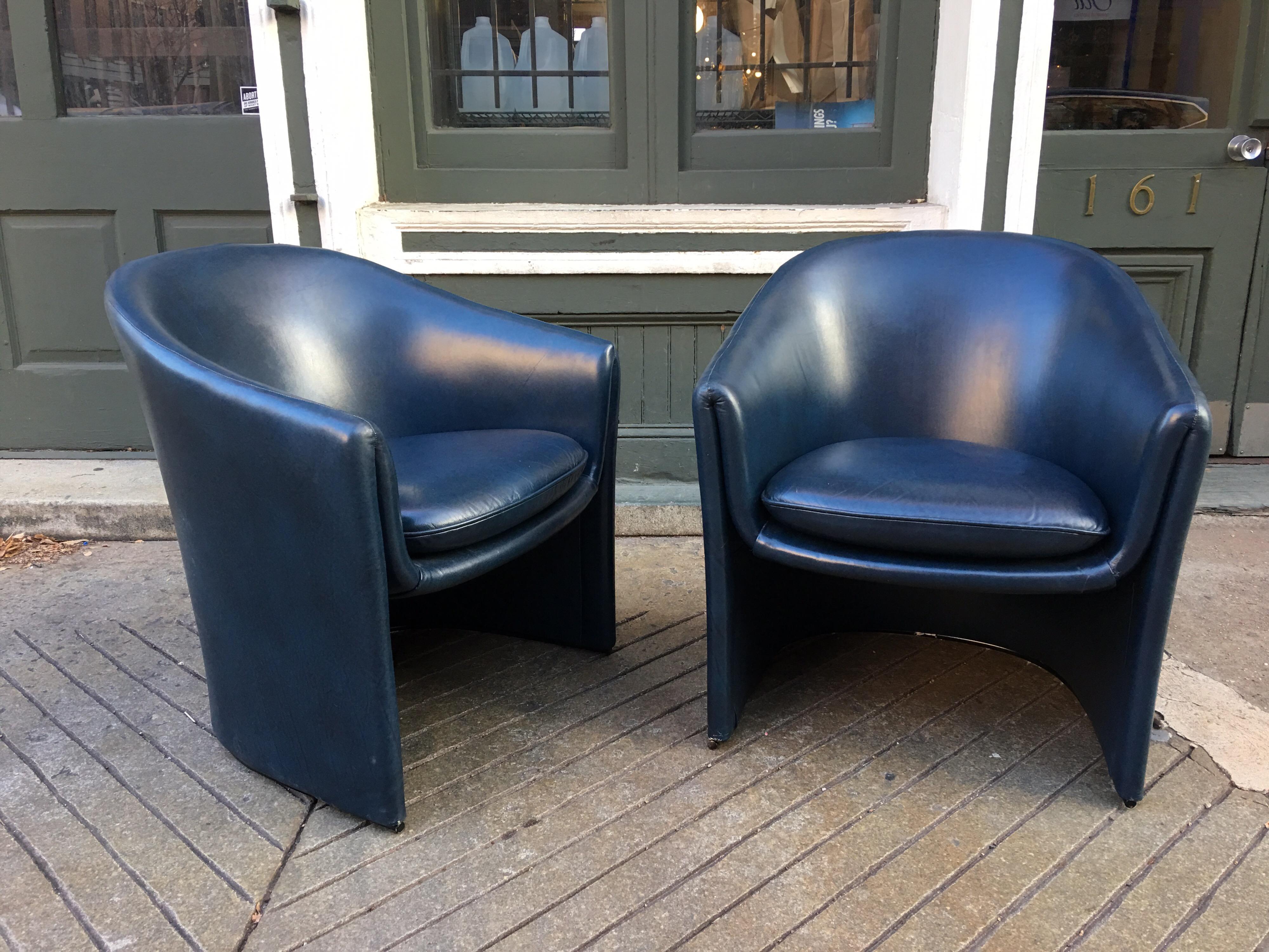 Pair of Dunbar chairs in a Dark Vinyl, possibly designed by Roger Sprunger?! Great scale and very comfortable.