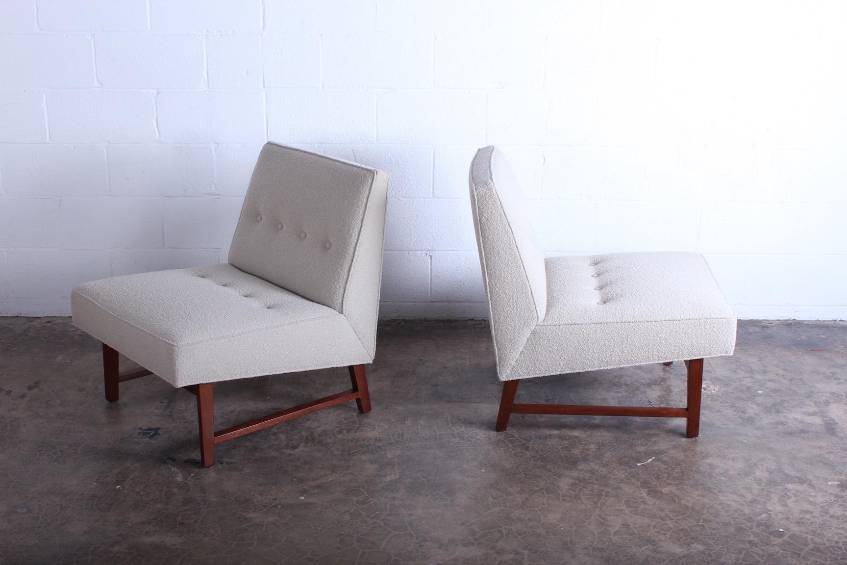 A pair of beautifully restored slipper chairs with mahogany frames. Designed by Edward Wormley for Dunbar.