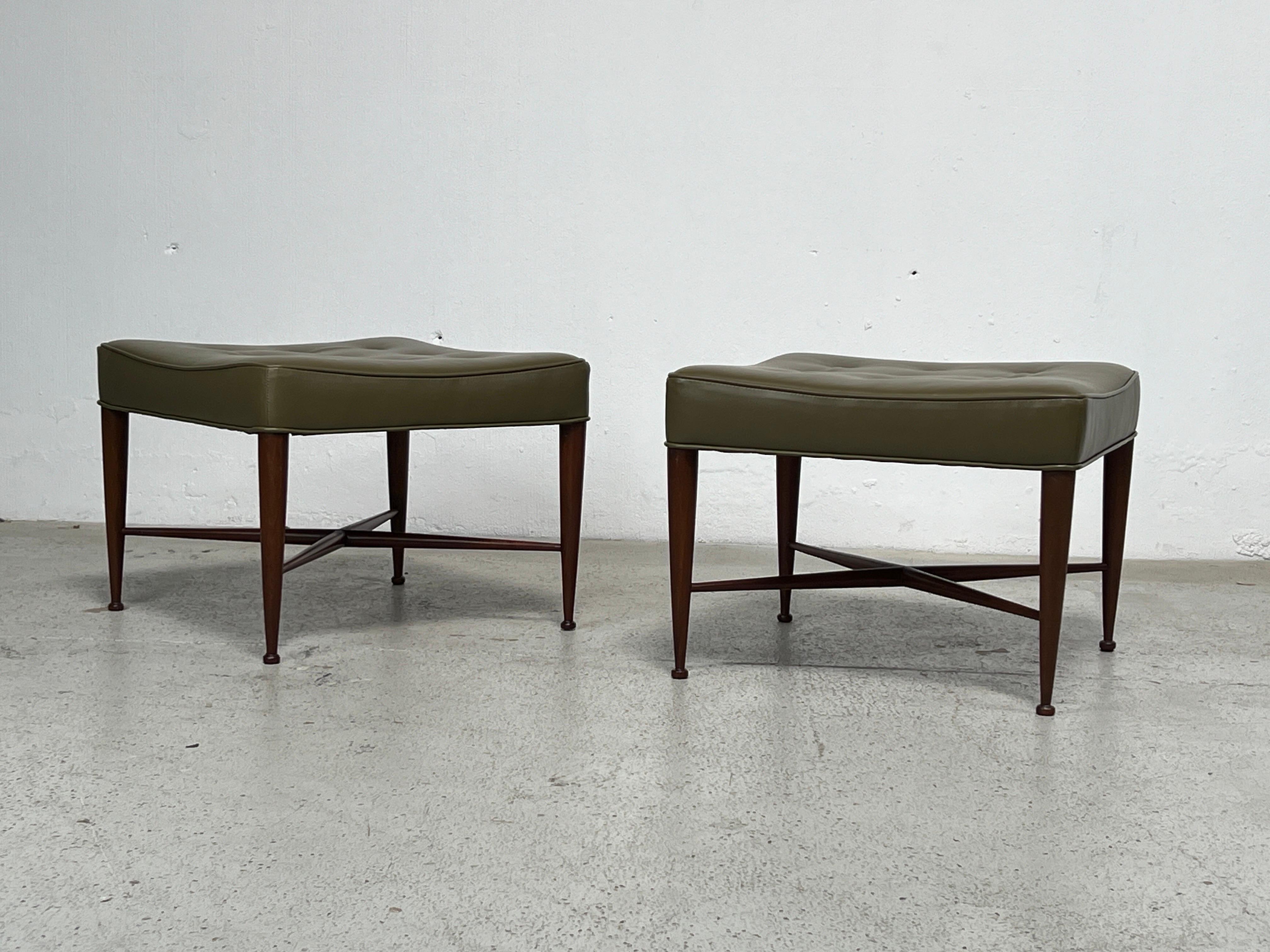 A pair of mahogany and leather Thebes stools designed by Edward Wormley for Dunbar. Fully restored. 