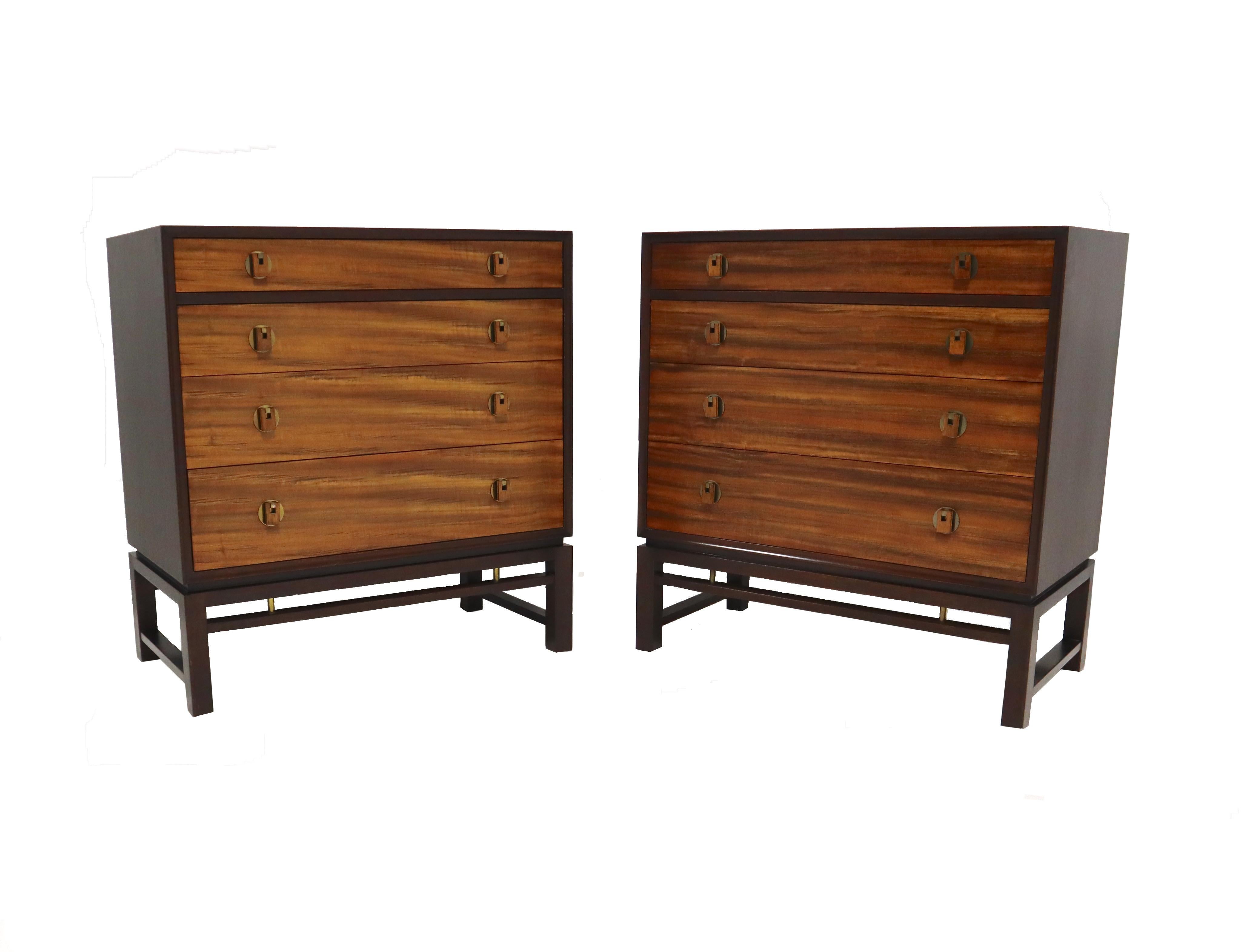 Pair of four-drawer chests by Edward Wormley for Dunbar. Espresso stained cases, walnut drawers, with rosewood and brass pulls.