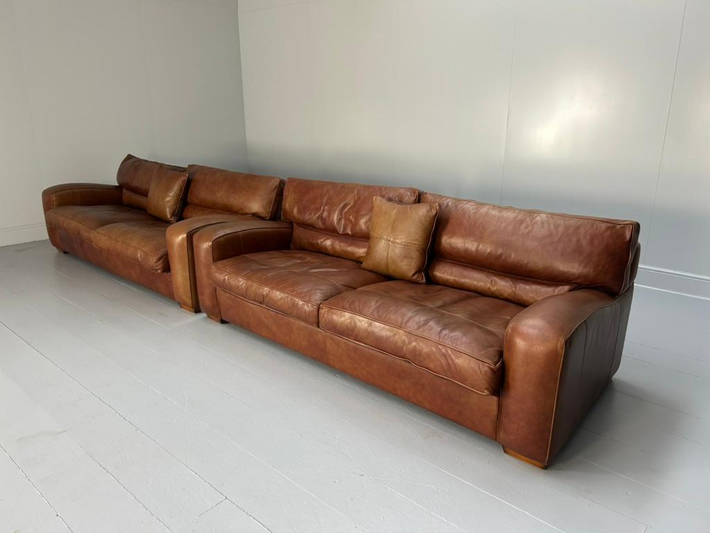 On offer on this occasion is an irresistibly-handsome identical pair of Duresta “Panther” 2.5-Seat Sofas, dressed in their peerless top-grade, heavily-antiqued Chestnut-Brown “Niven” Leather.
 
As you will no doubt be aware by your interest in this