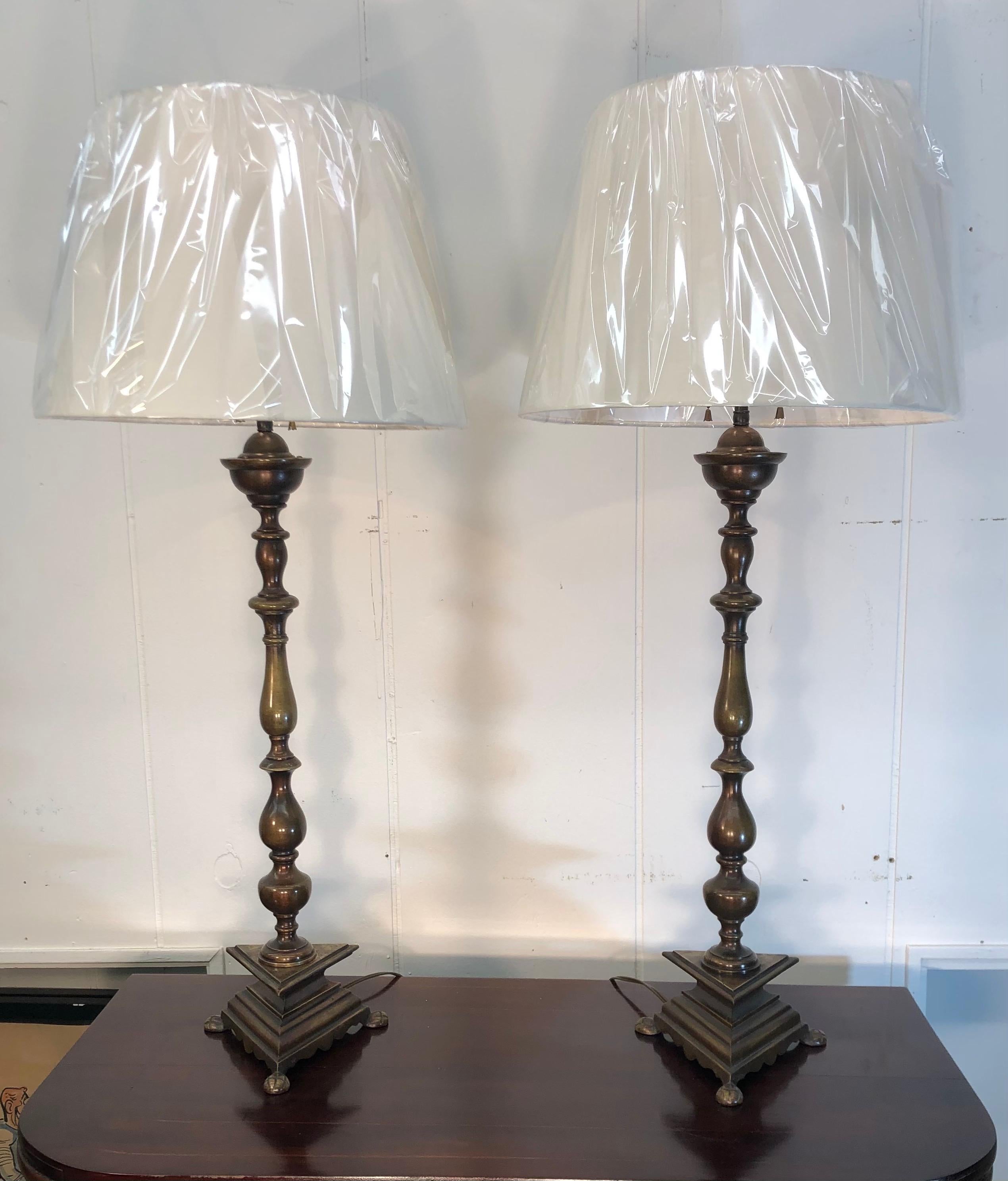 This grand scale pair of Dutch Colonial style lamps have a beautiful hand-rubed patinated bronze finish.  