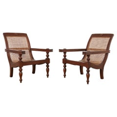 Vintage Pair of Dutch Colonial Style Mahogany Cane Plantation Chairs