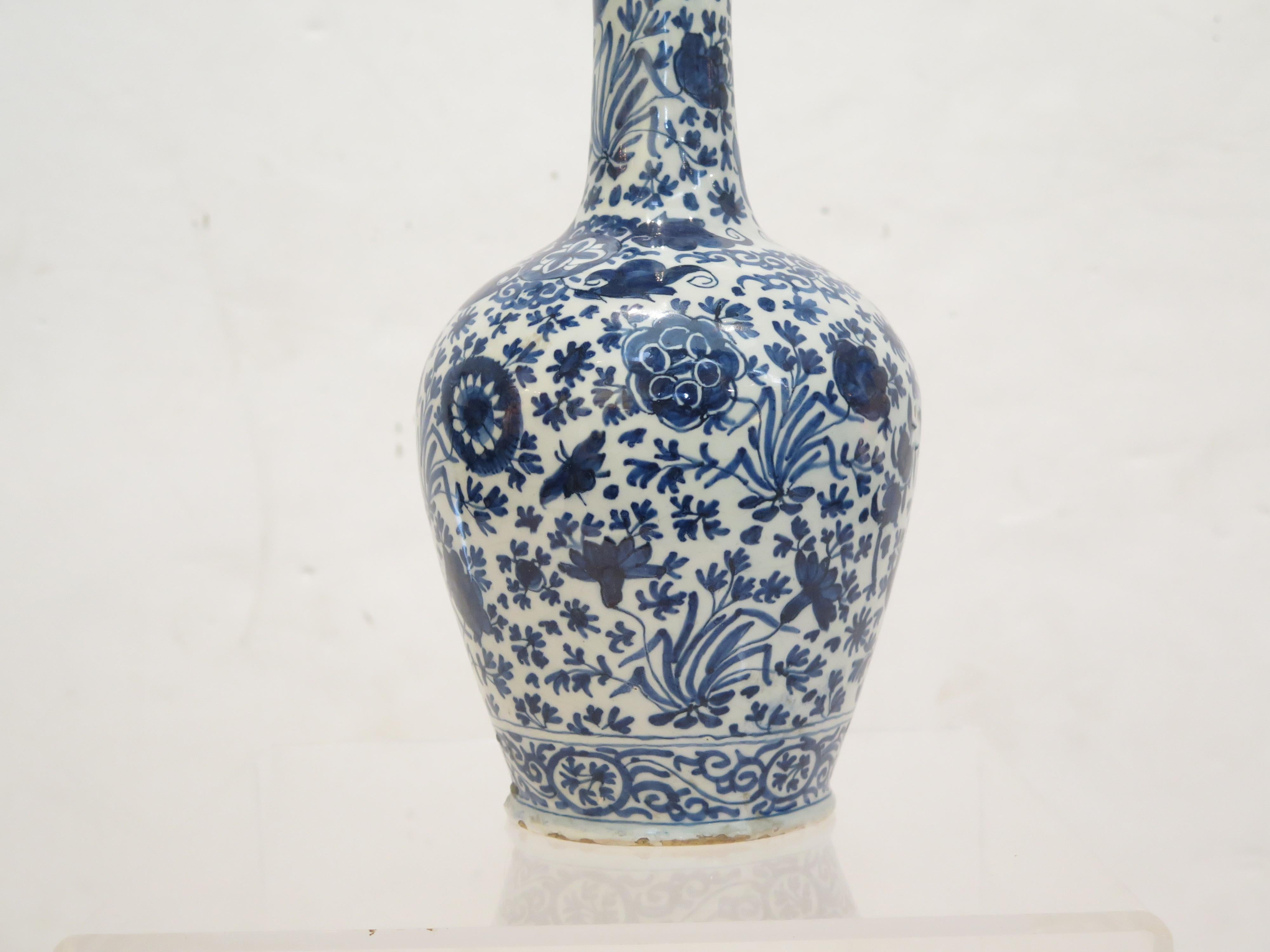 Clay Pair of Dutch Delft Blue and White Bottle Vases For Sale