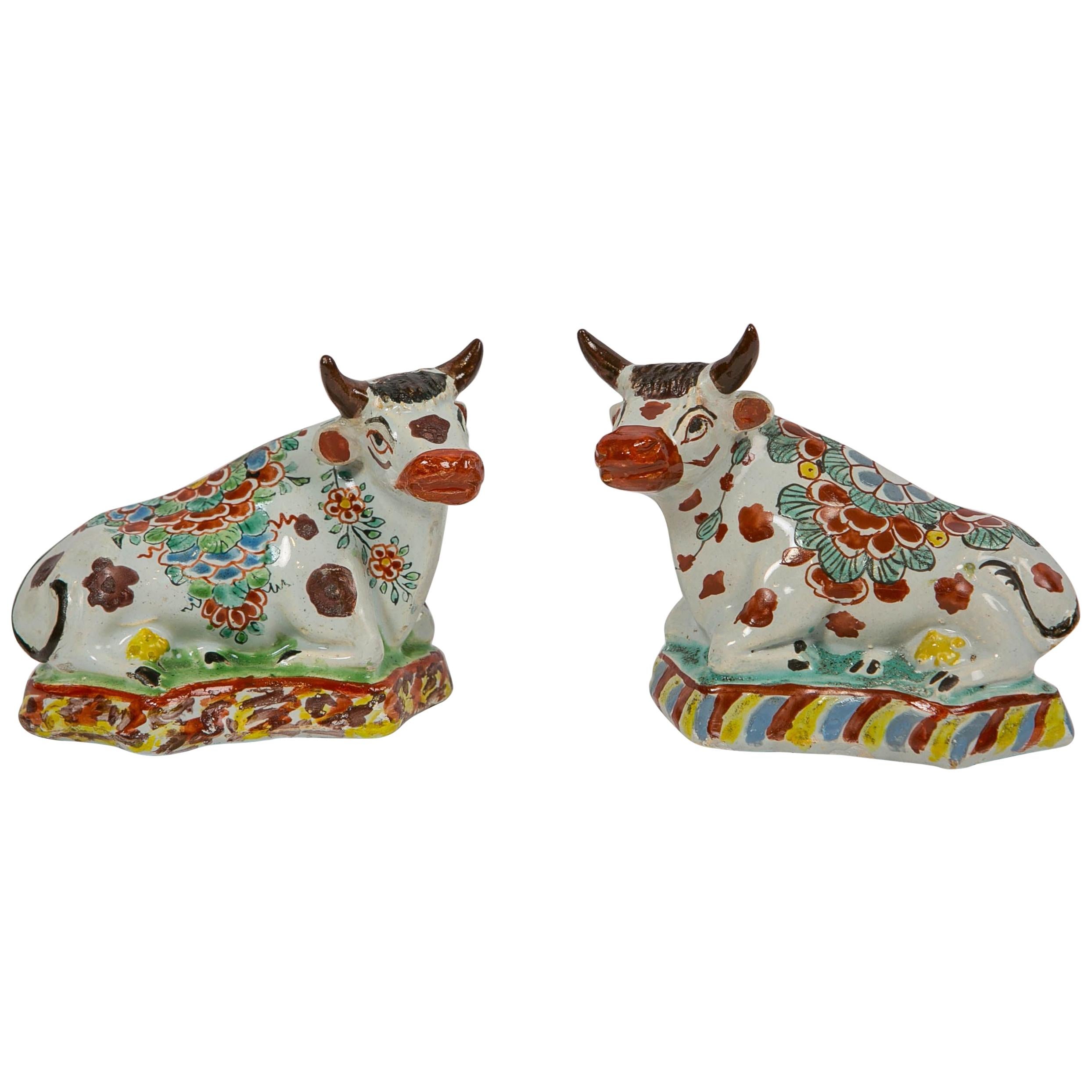 Pair of Dutch Delft Cows Painted in Polychrome Petit Feu Colors Made circa 1760
