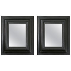 Pair of Dutch Ebonized Cushion Frame Mirrors