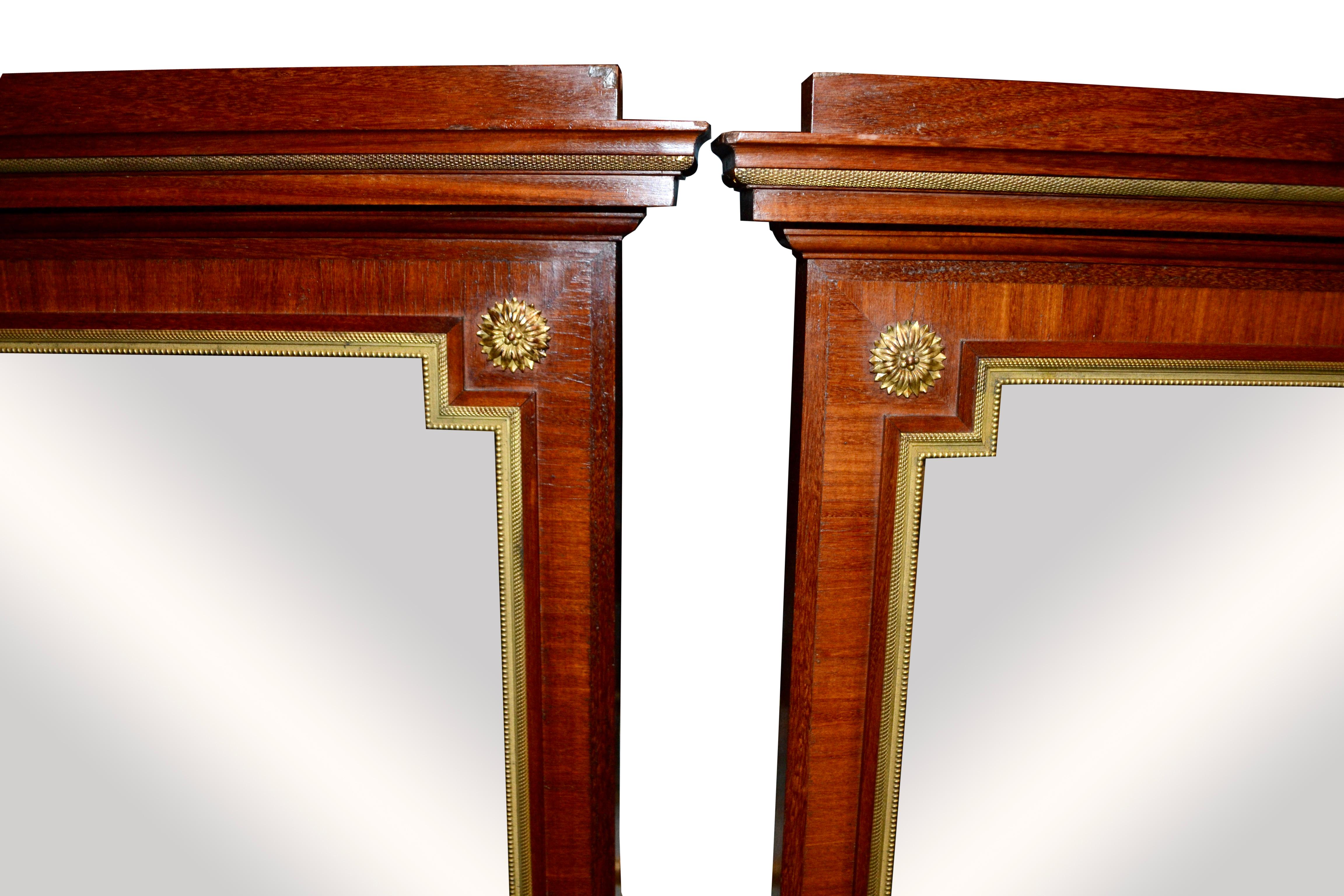 20th Century Pair of Dutch Empire Stained Wood, Gilt Bronze and Beveled Glass Mirrors For Sale