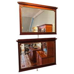Pair of Dutch Empire Stained Wood, Gilt Bronze and Beveled Glass Mirrors
