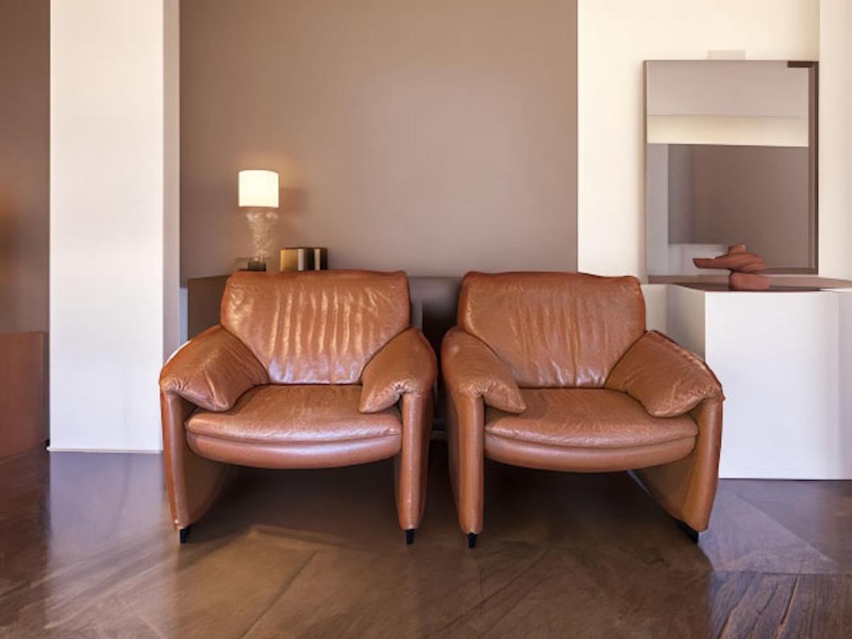 Pair of Bora Bora lounge chairs by Leolux in a cognac leather with age-appropriate patina, Netherlands, circa 1980s. In good overall condition. Dimensions: 36